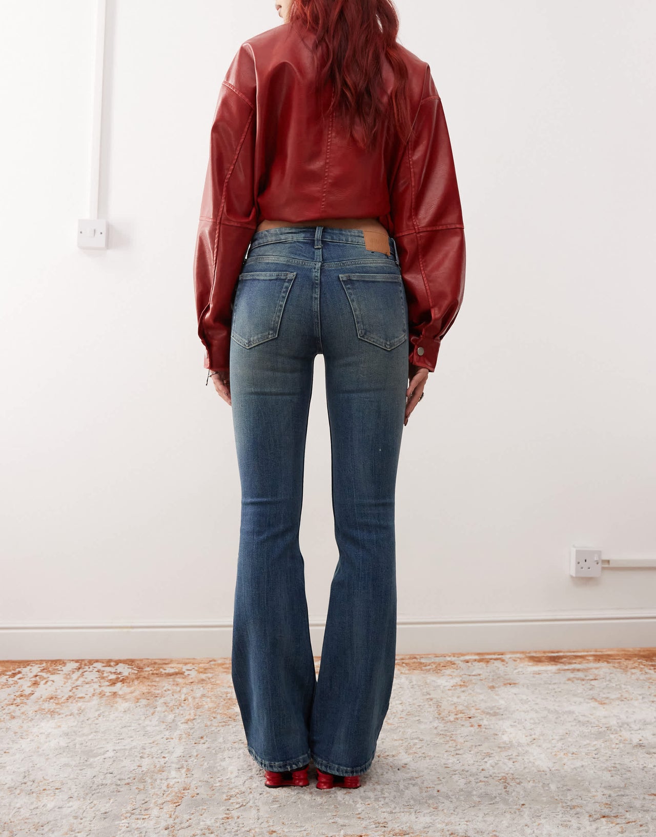 Weekday Flame low waist flared jeans in gasoline blue