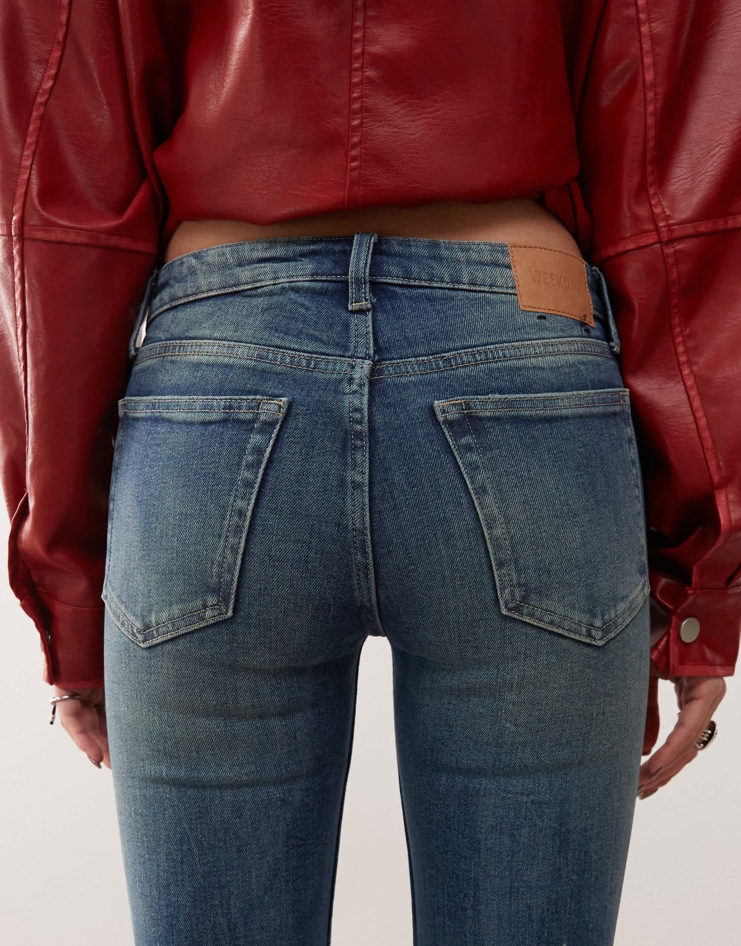 Weekday Flame low waist flared jeans in gasoline blue