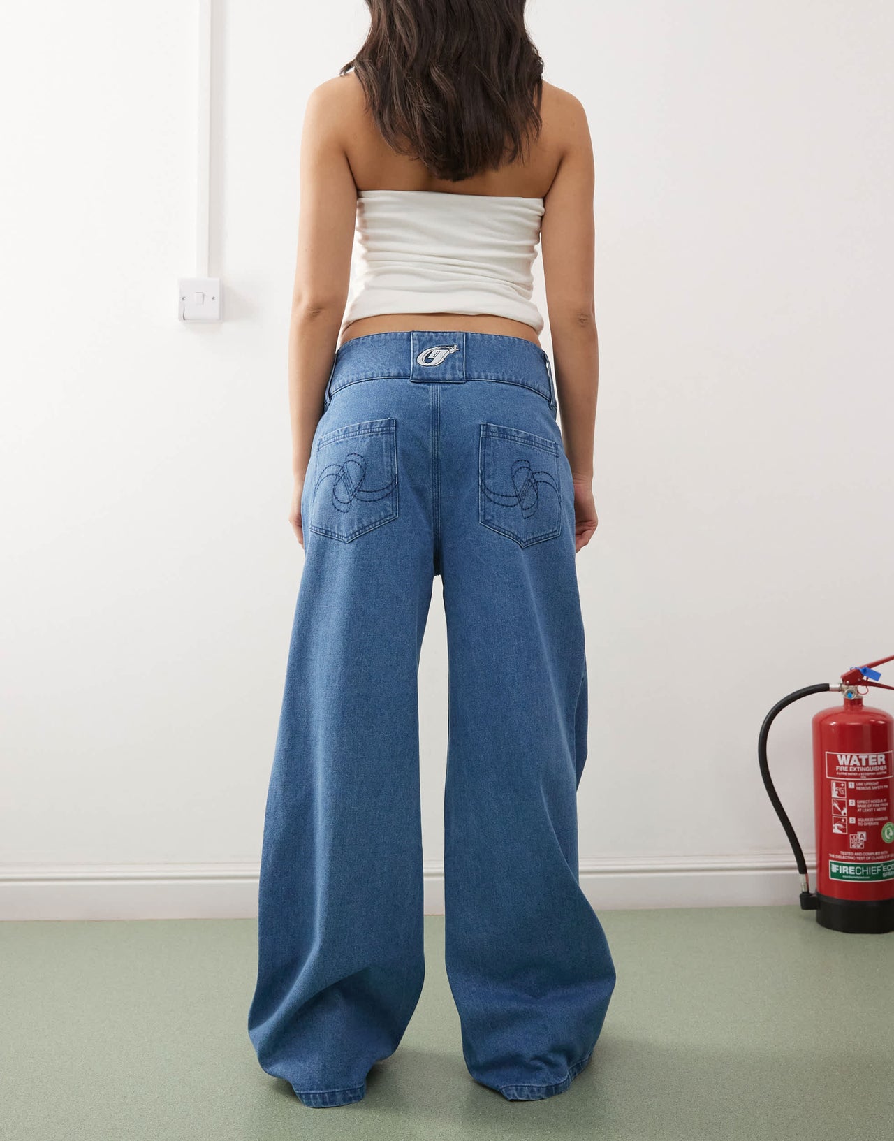 Heretic Nine extra wide leg denim jeans in mid blue