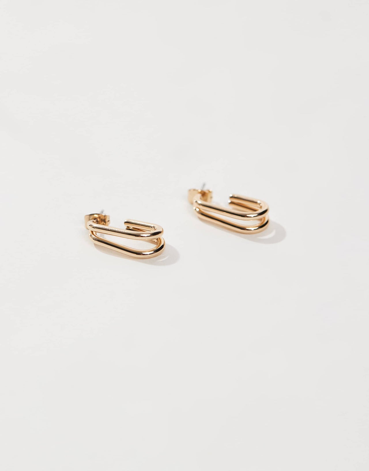Pieces molten snake stud earrings in gold