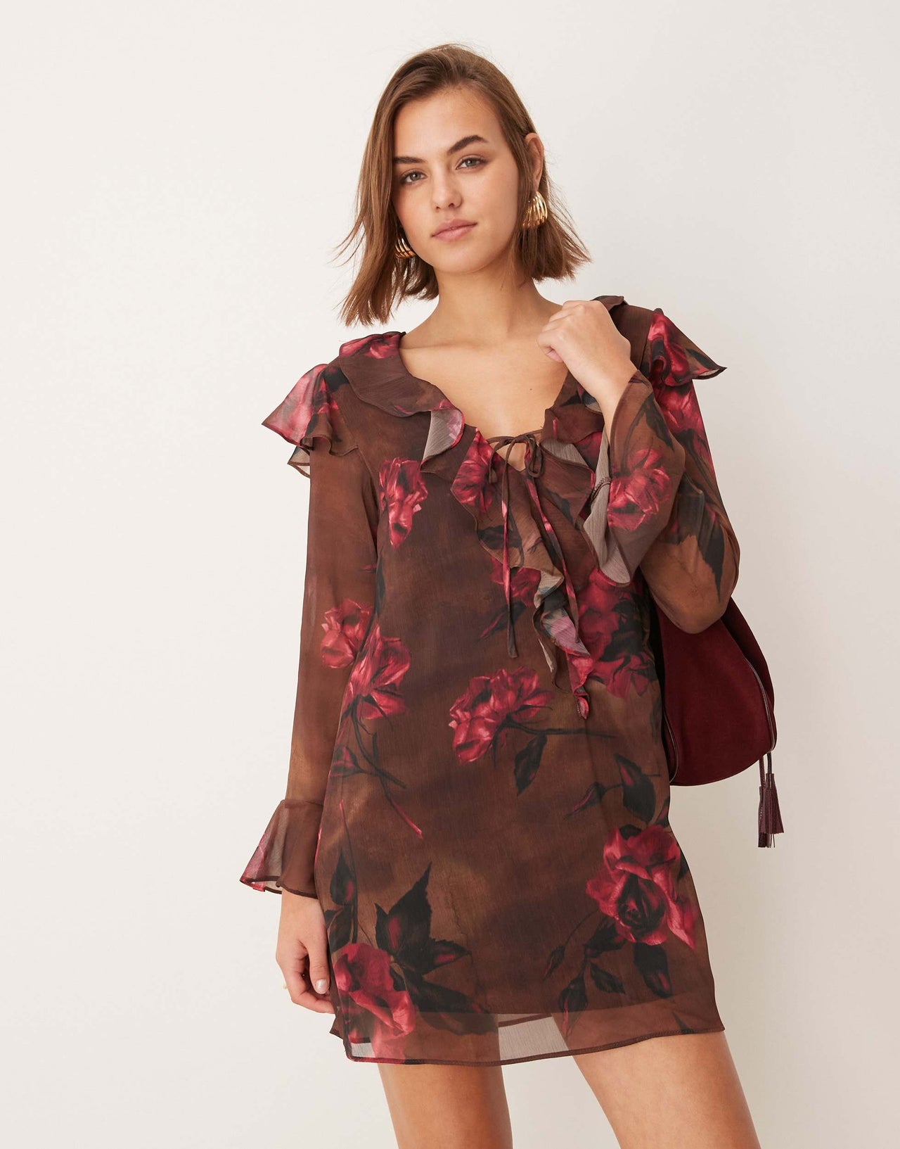 New Look floral ruffle tie neck mini dress in brown print