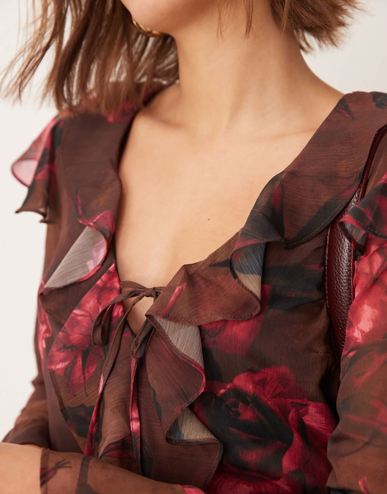 New Look floral ruffle tie neck mini dress in brown print