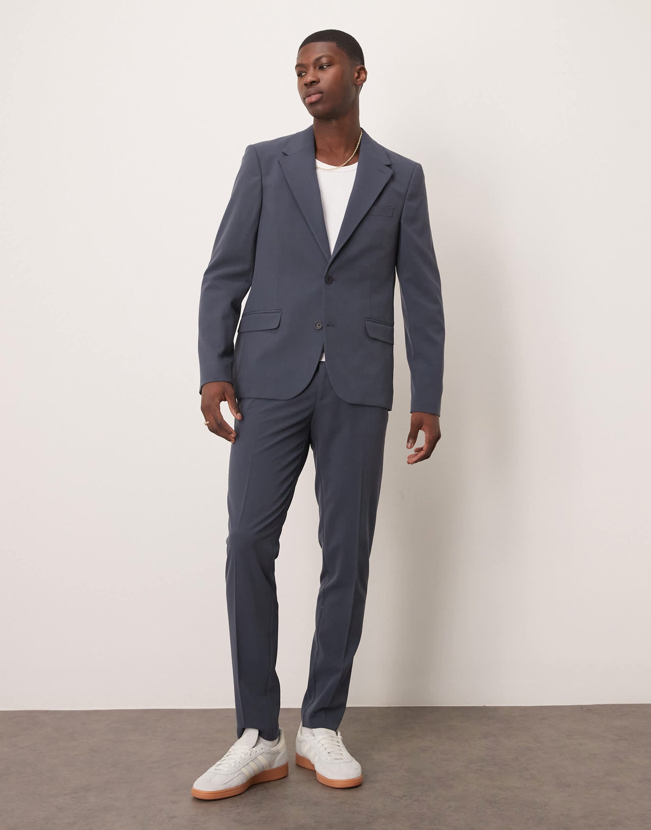ASOS DESIGN four way stretch skinny fit suit jacket in navy