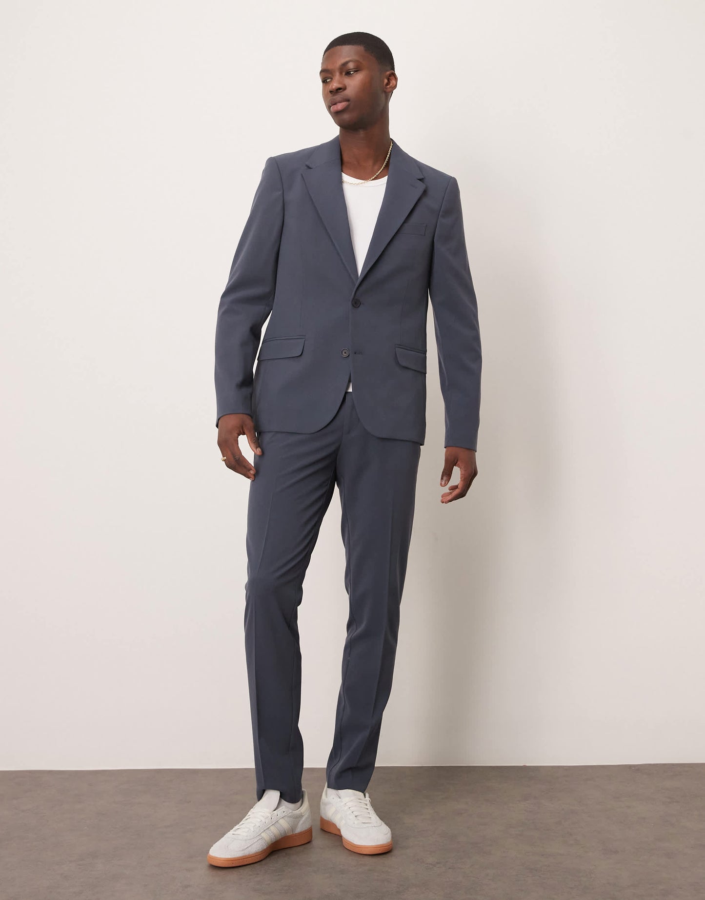 ASOS DESIGN four way stretch skinny fit suit jacket in navy