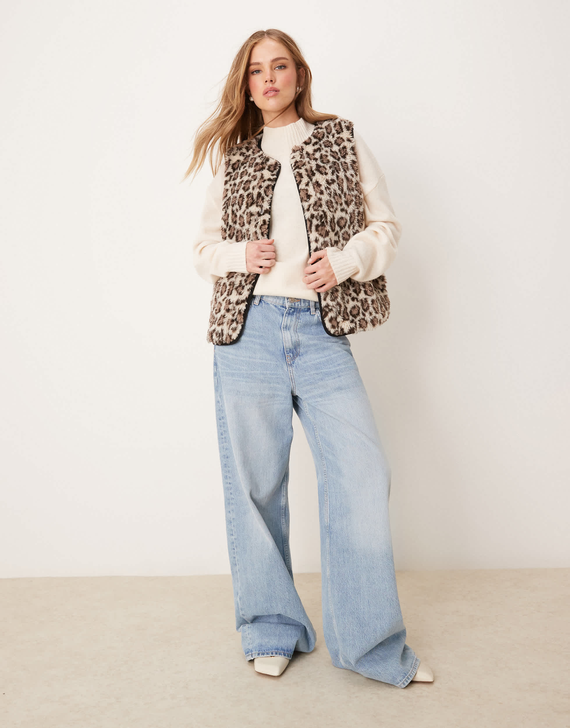 New Look borg sleeveless jacket in animal print