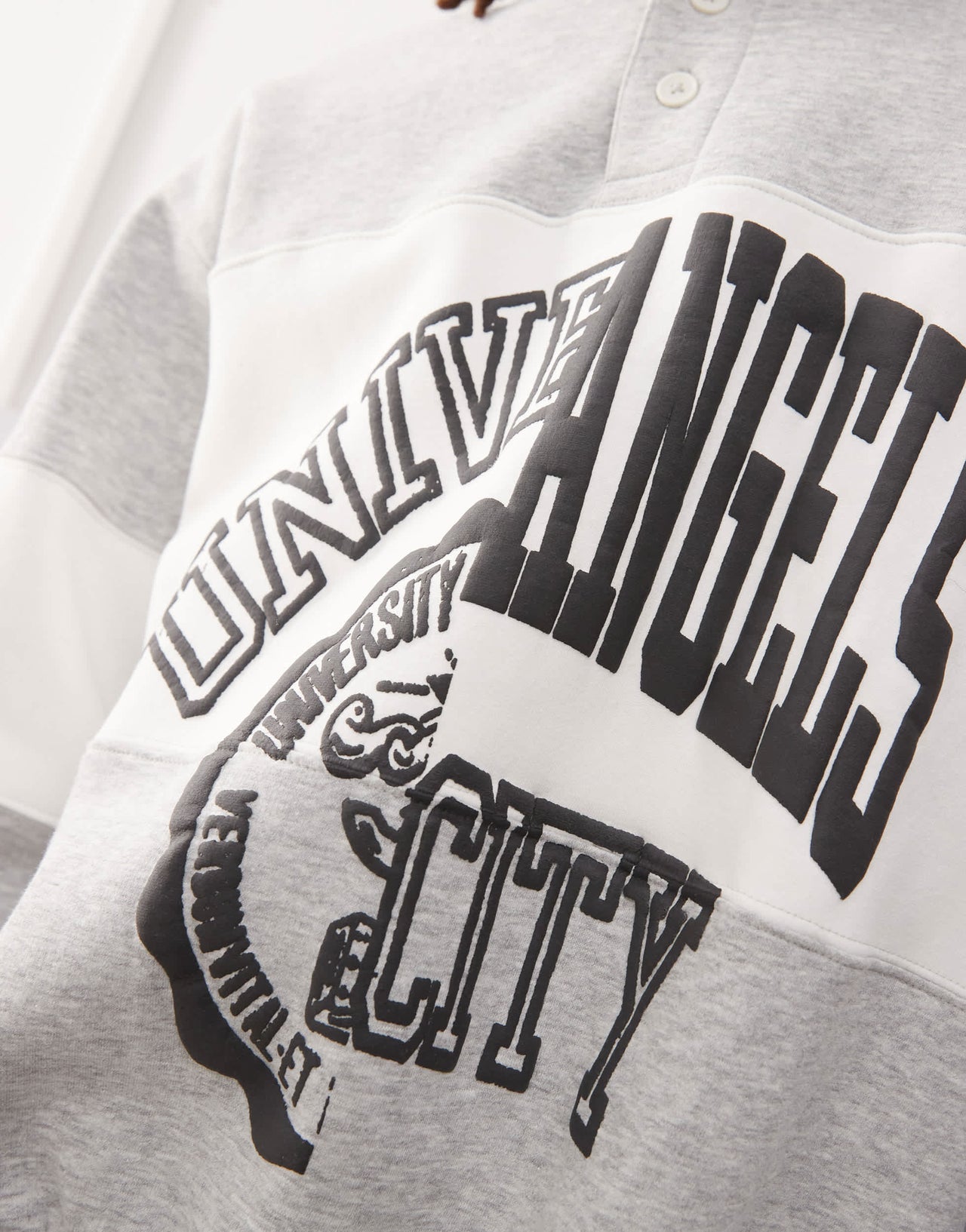 Weekday Andre oversized polo sweatshirt with cut and sew varsity graphic in grey melange
