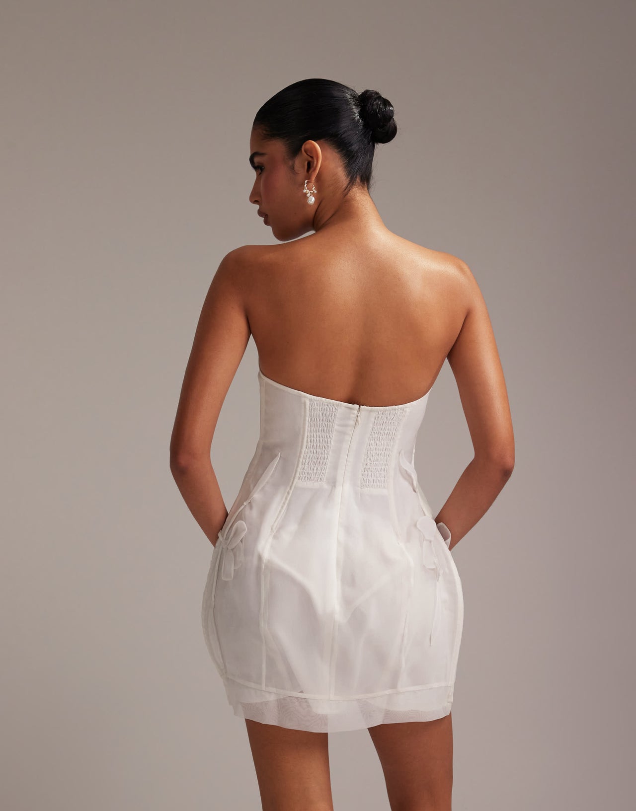 ASOS DESIGN bandeau mini dress with trailing 3D flowers in white
