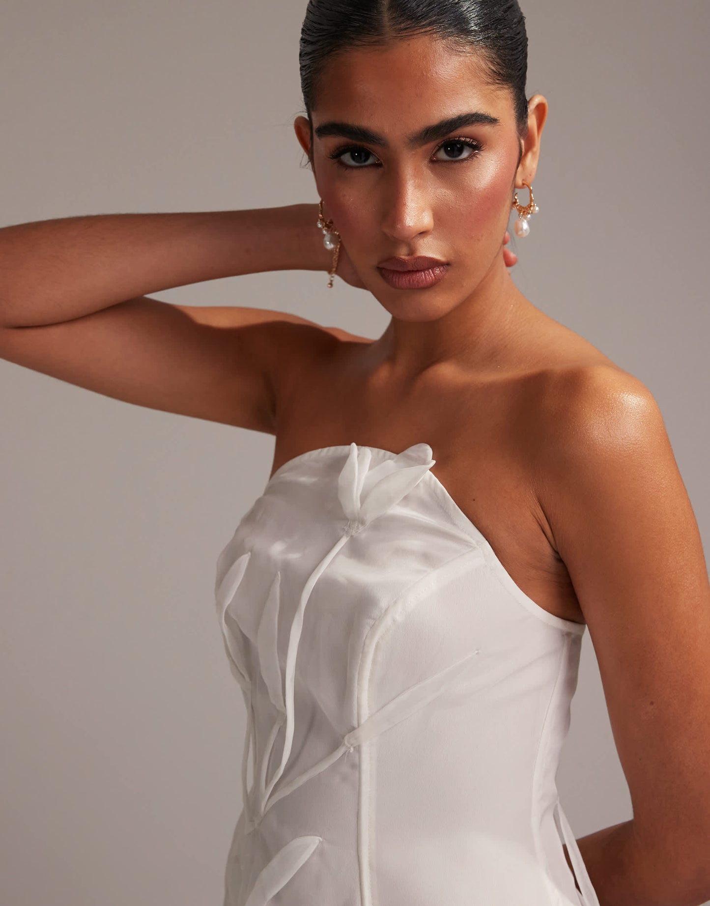 ASOS DESIGN bandeau mini dress with trailing 3D flowers in white
