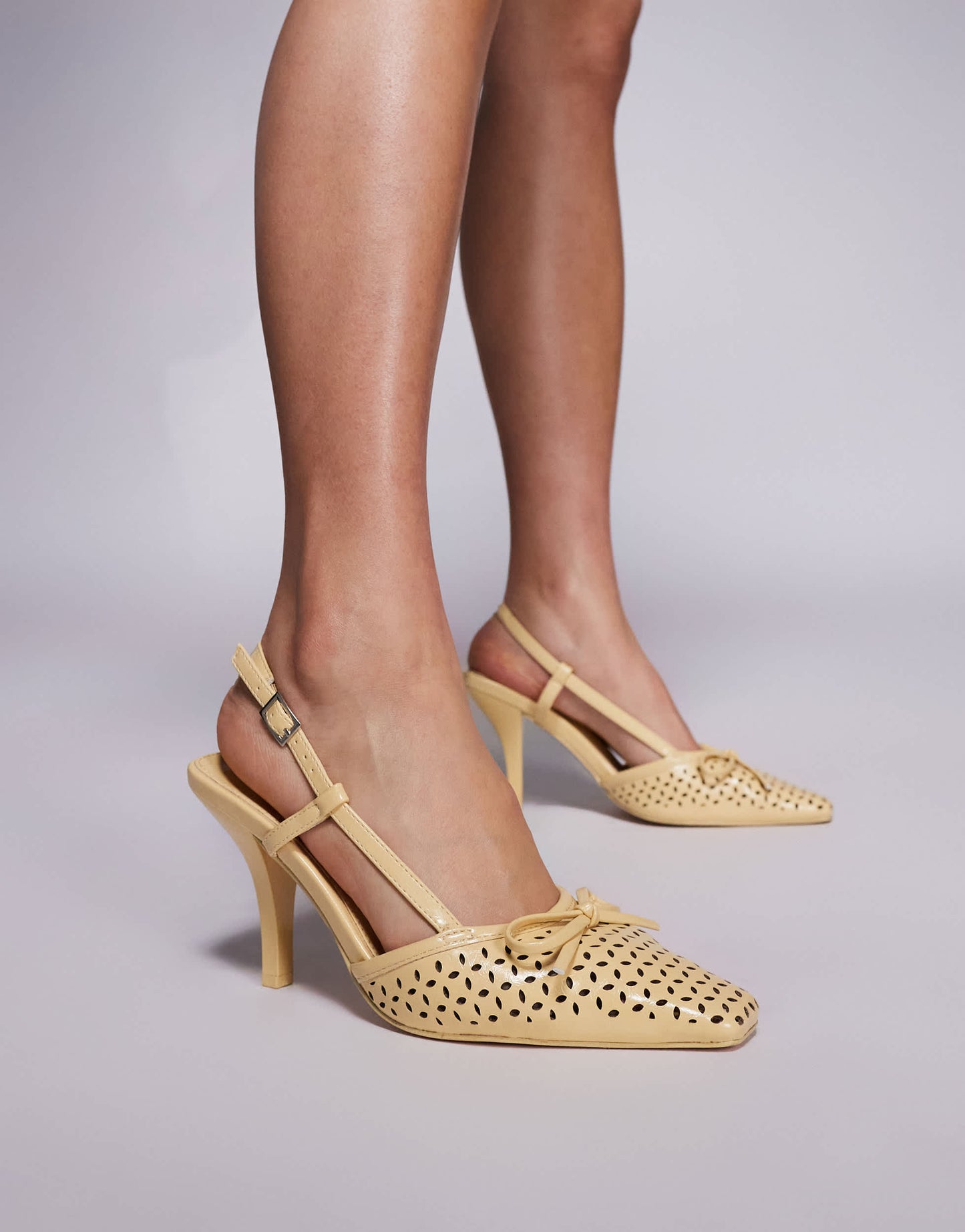 Public Desire Alchemy laser cute sling back heels with bow in yellow