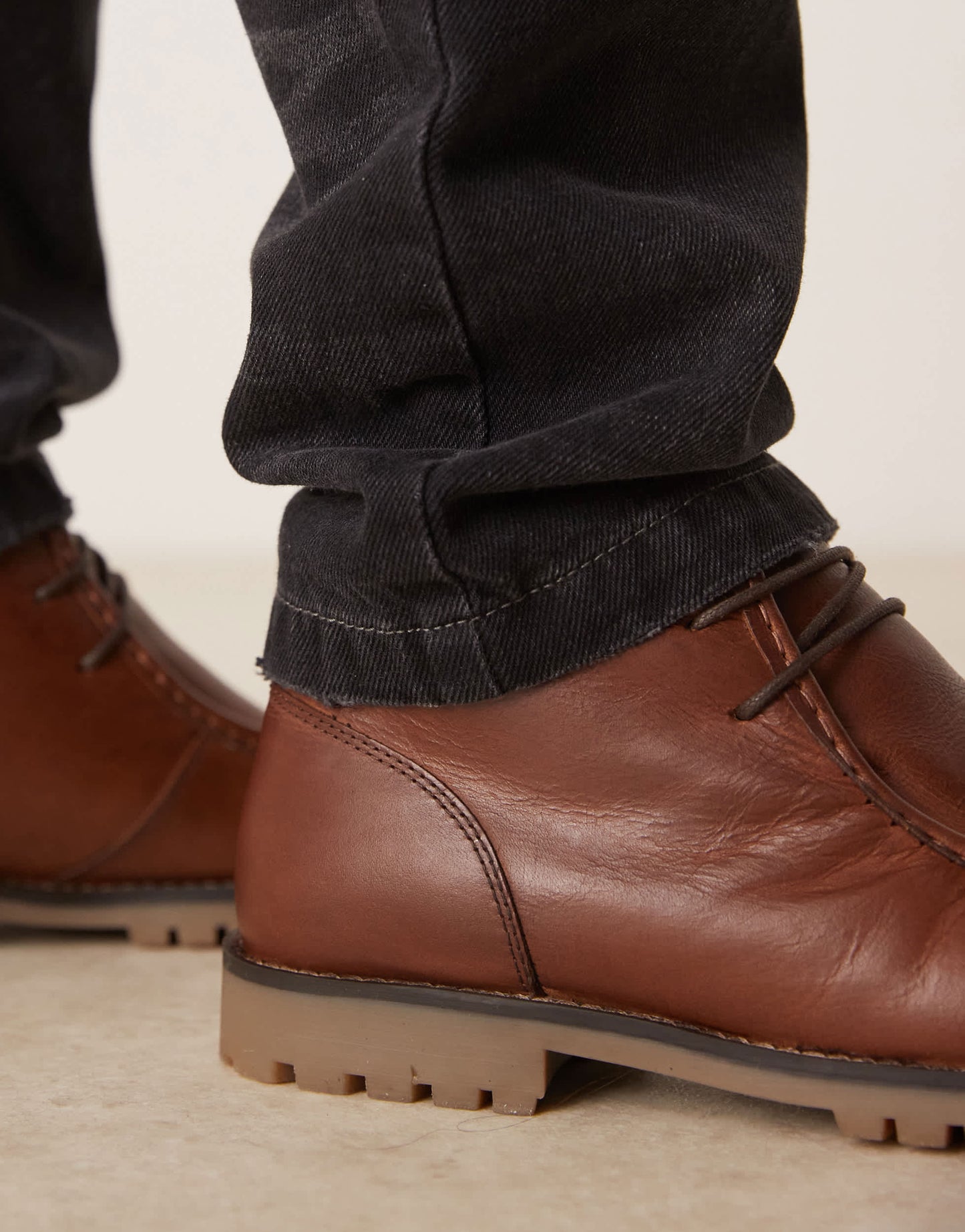 ASOS DESIGN apron boots in tan leather with cleated sole