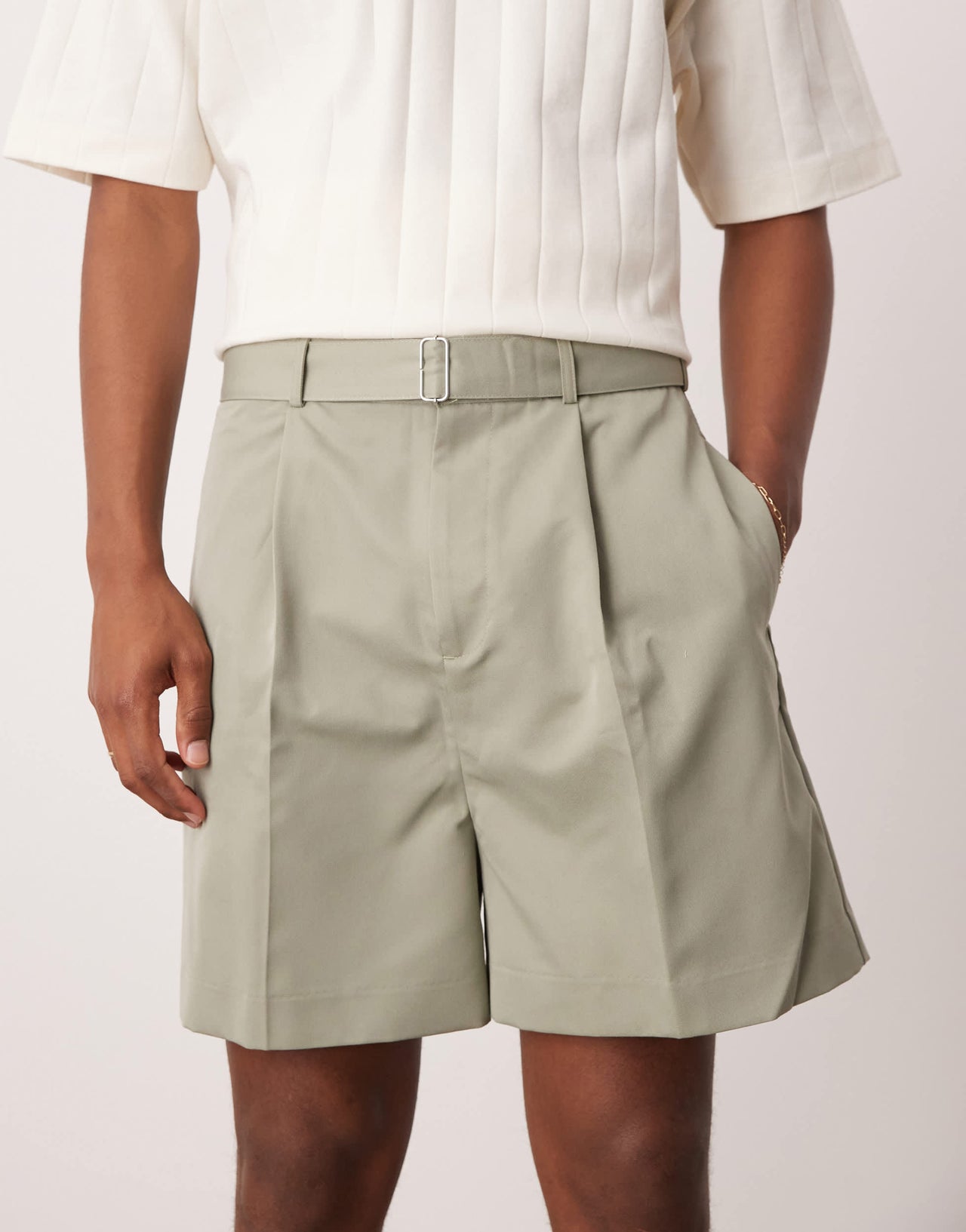ASOS DESIGN smart bermuda shorts with front pleat and belt detail in green