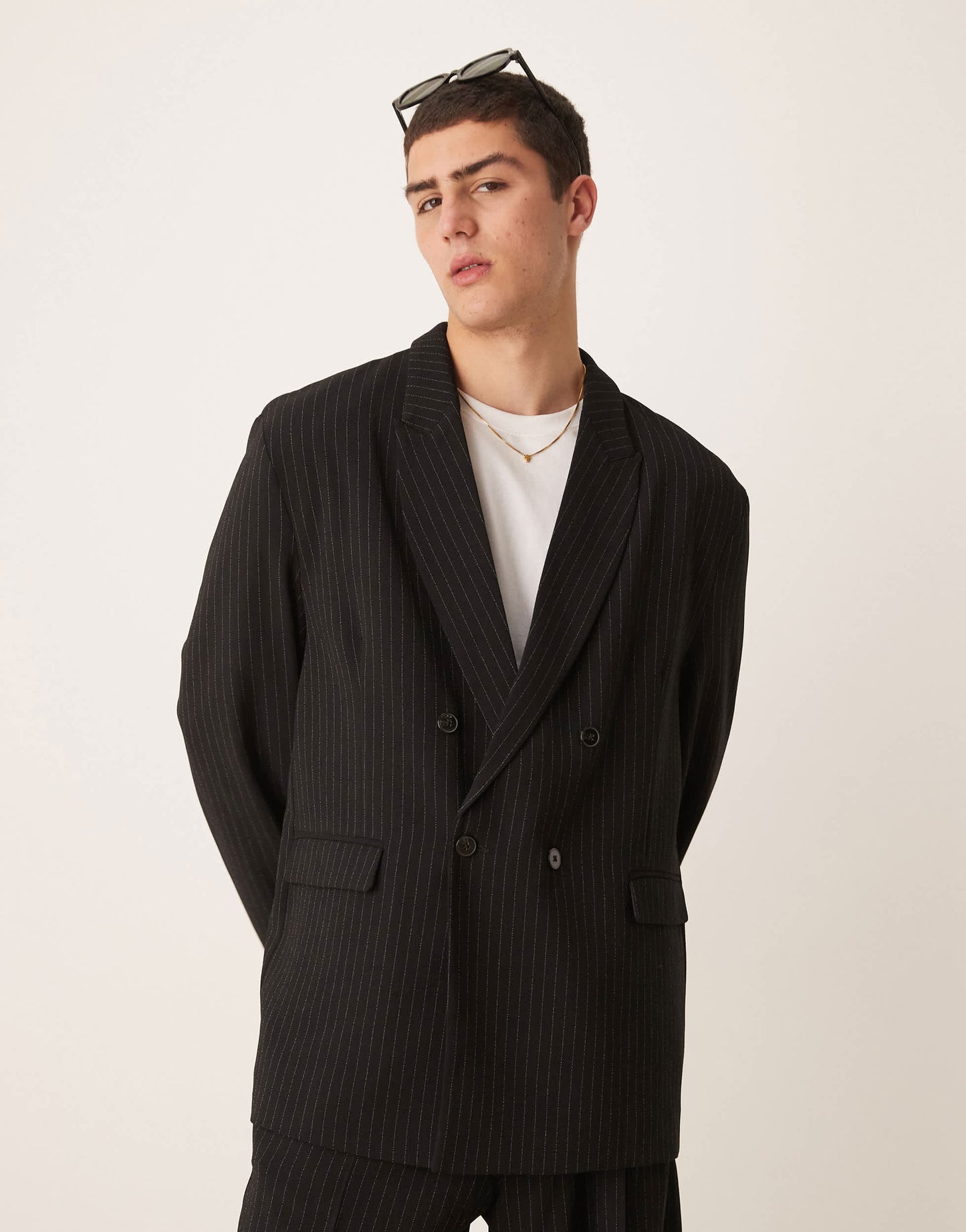 ASOS DESIGN slouchy oversized suit jacket in black pinstripe