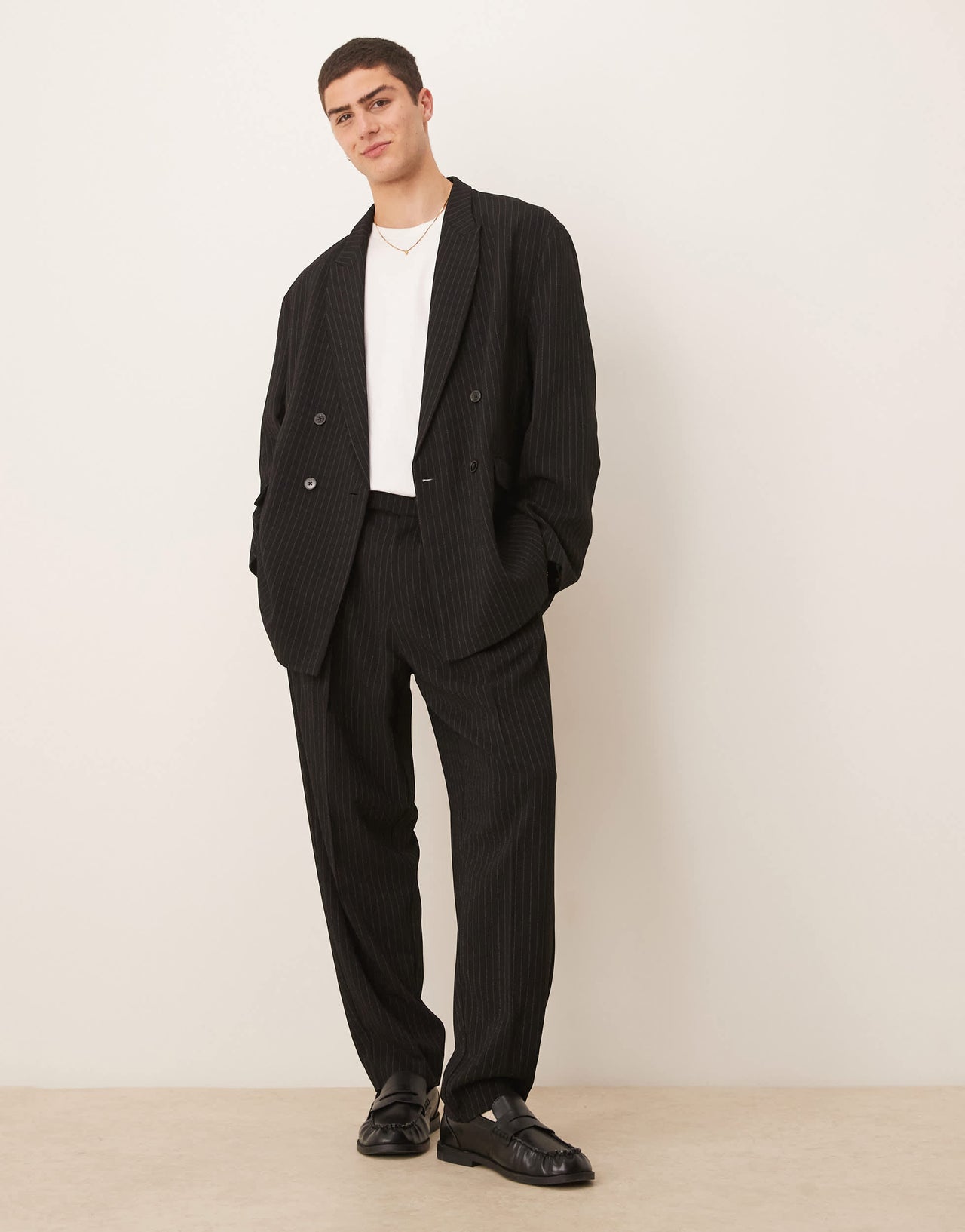 ASOS DESIGN slouchy oversized suit jacket in black pinstripe