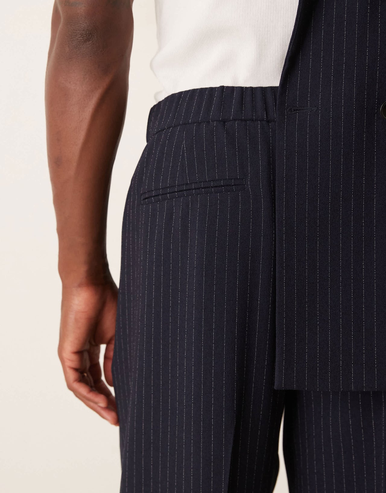 ASOS DESIGN oversized tapered suit trousers in navy&nbsp;pinstripe
