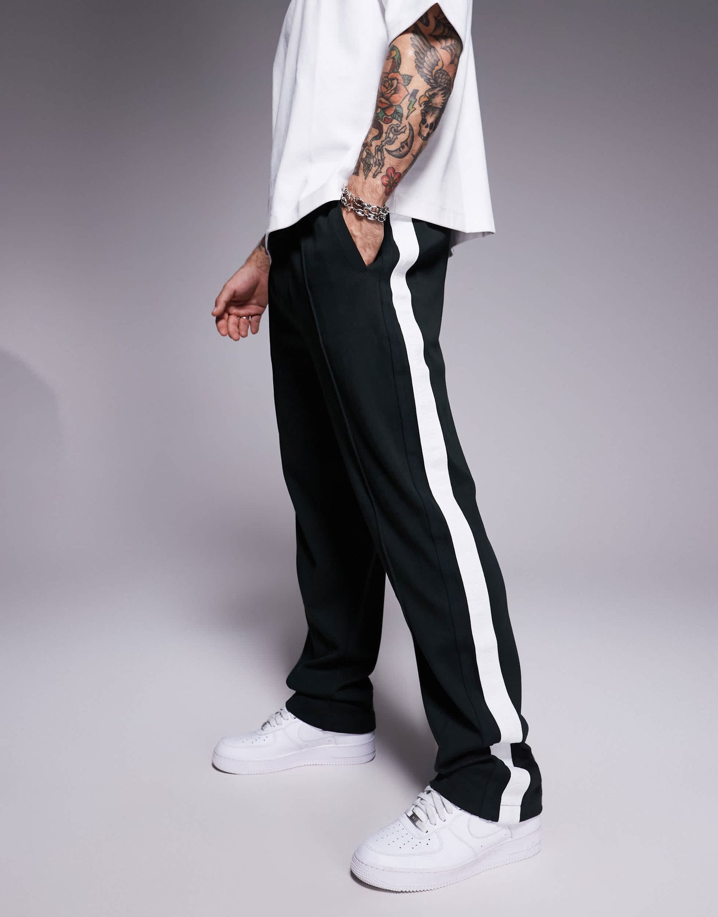 Armani Exchange tracksuit joggers with logo taping in green