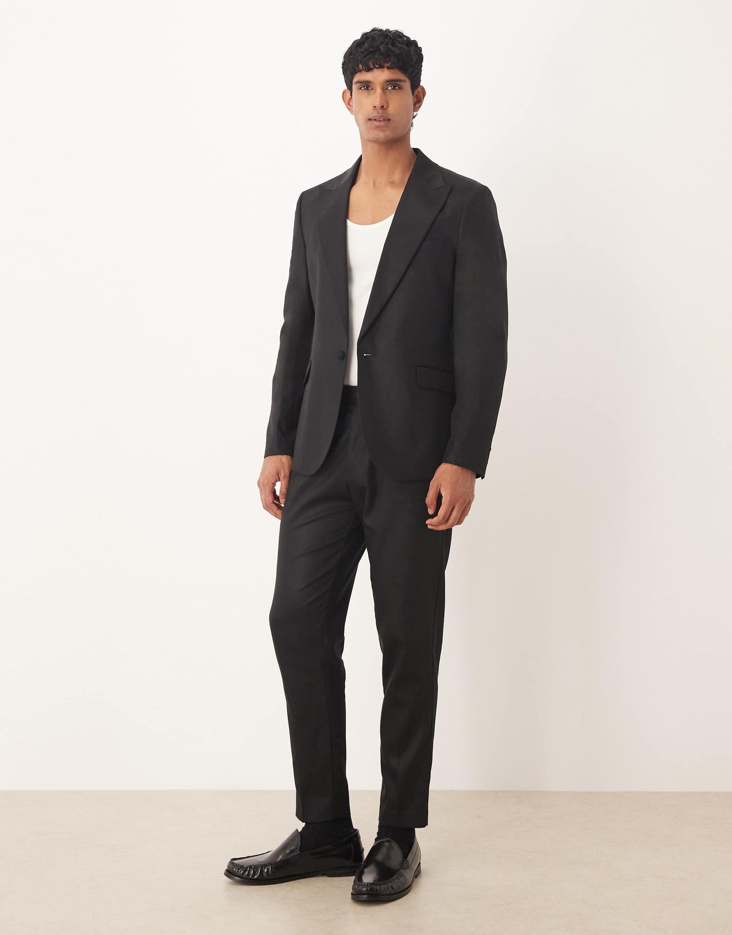 ASOS DESIGN tapered suit trousers with linen in black shine