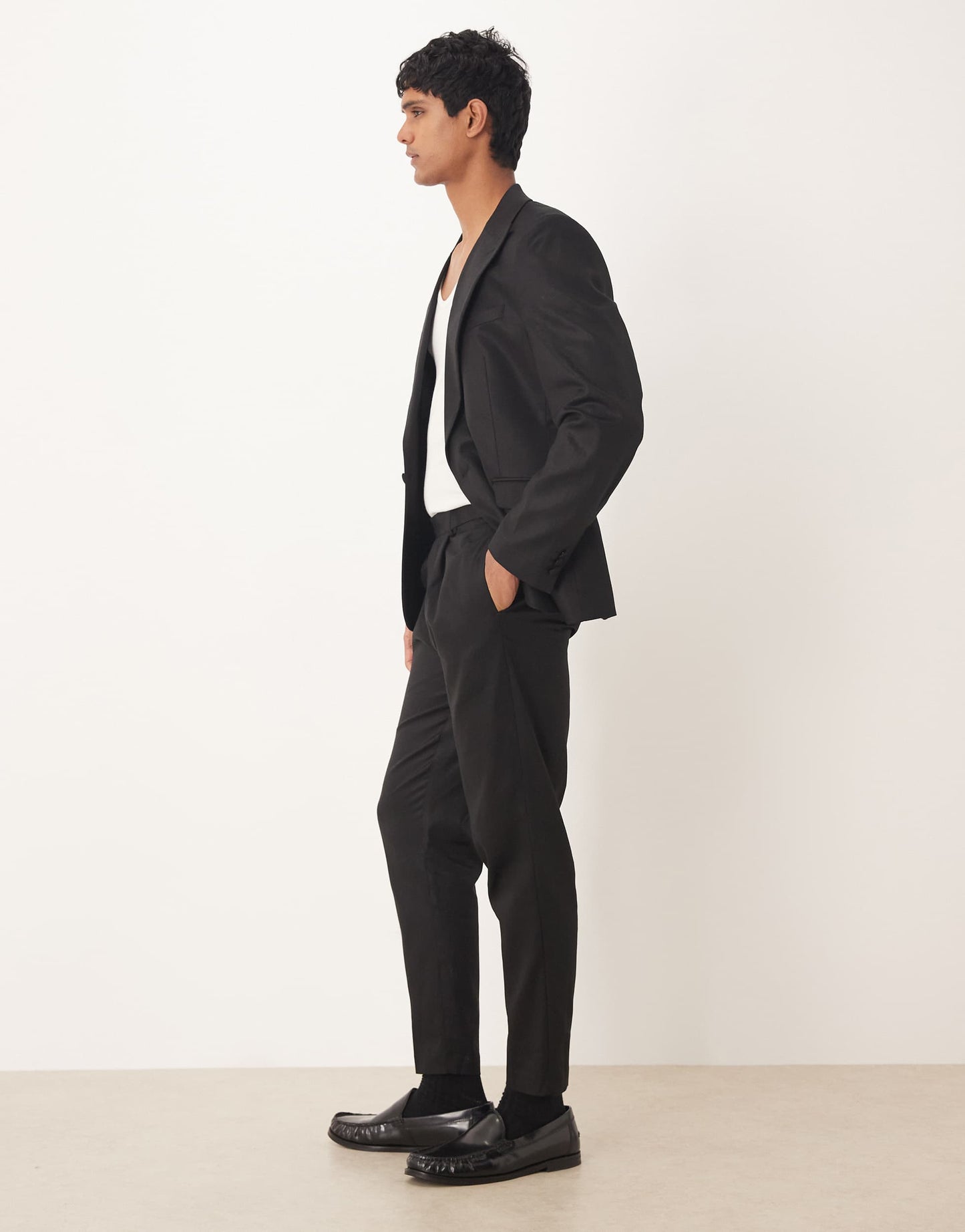 ASOS DESIGN tapered suit trousers with linen in black shine