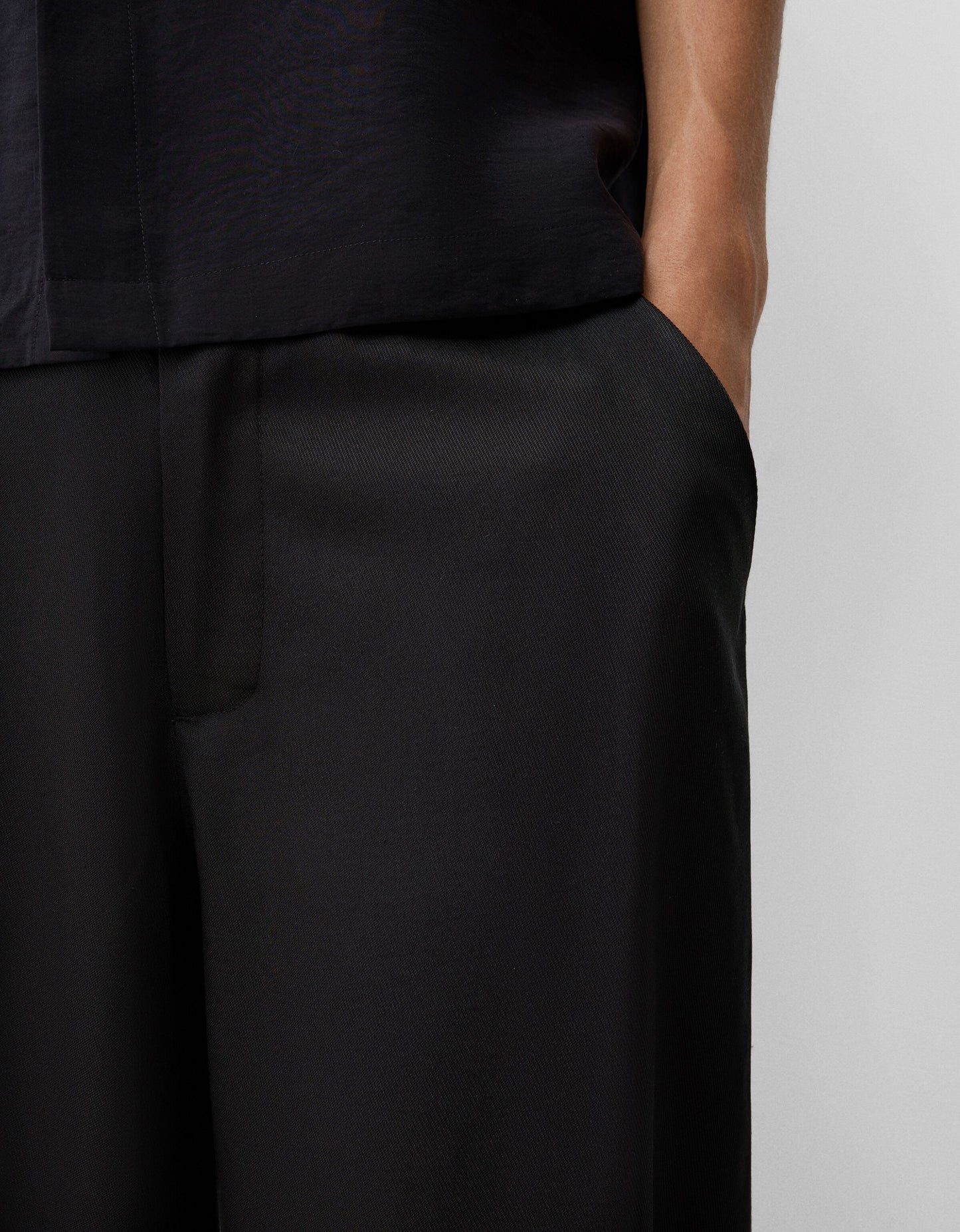 Bershka Collection baggy tailored trouser in black