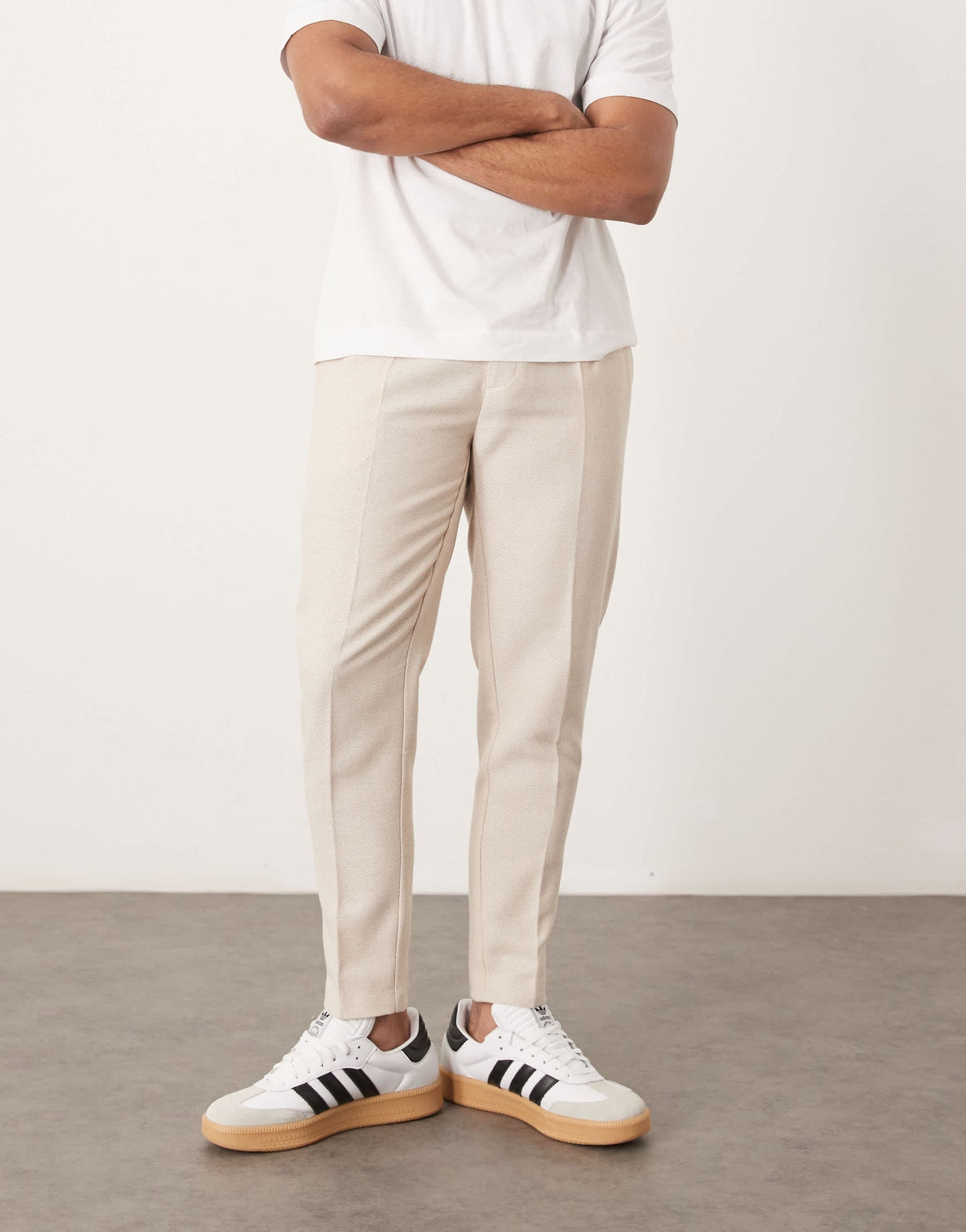 ASOS DESIGN smart tapered fit wool mix trousers with front pleat in stone