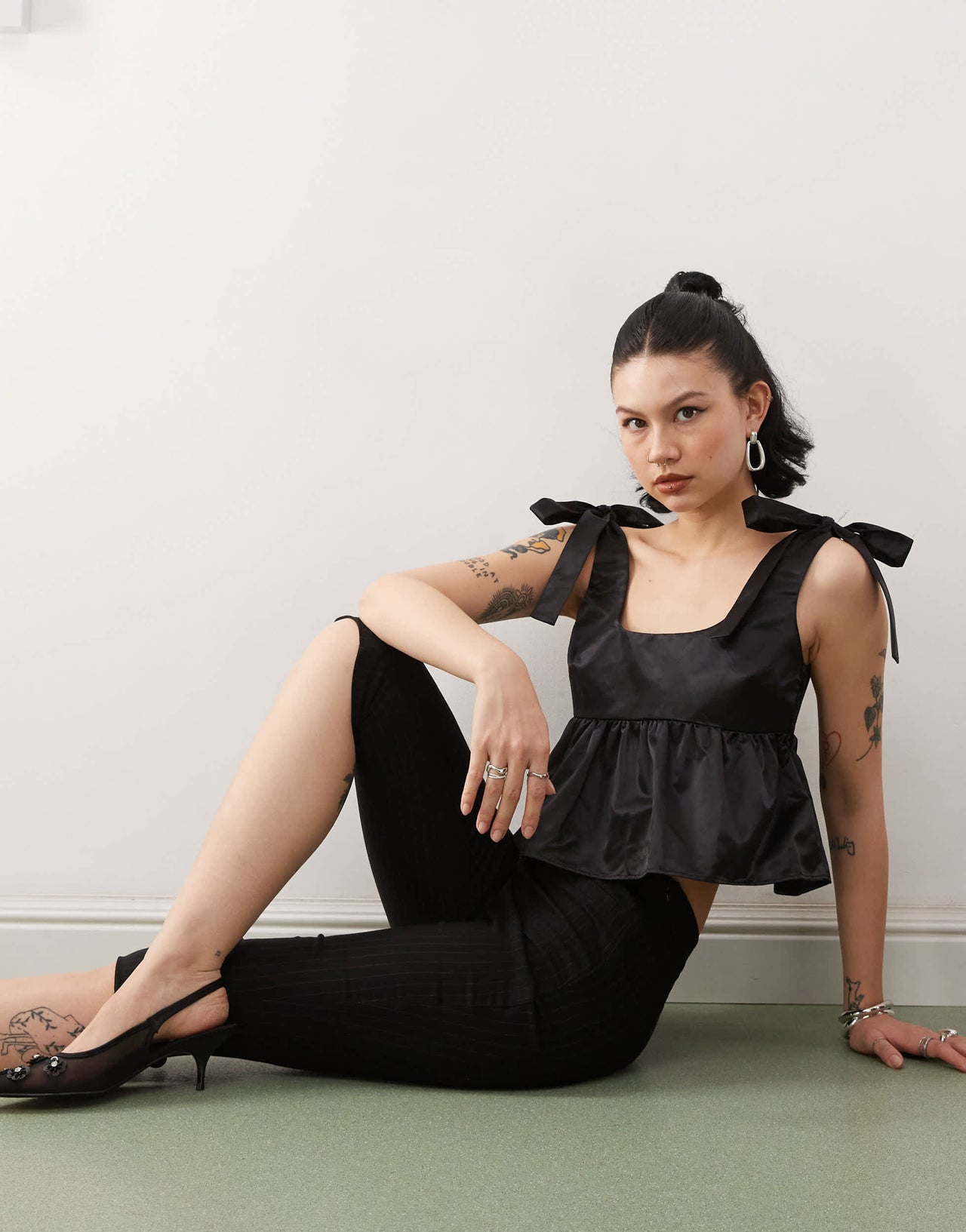 Monki satin peplum vest with bow strap detail in black