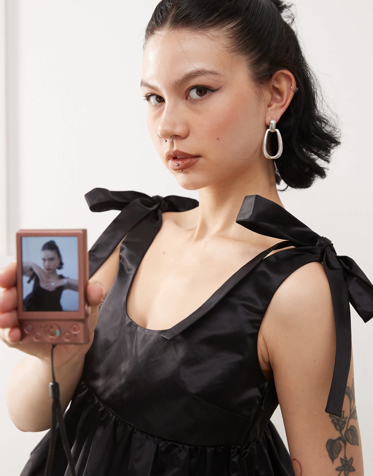 Monki satin peplum vest with bow strap detail in black