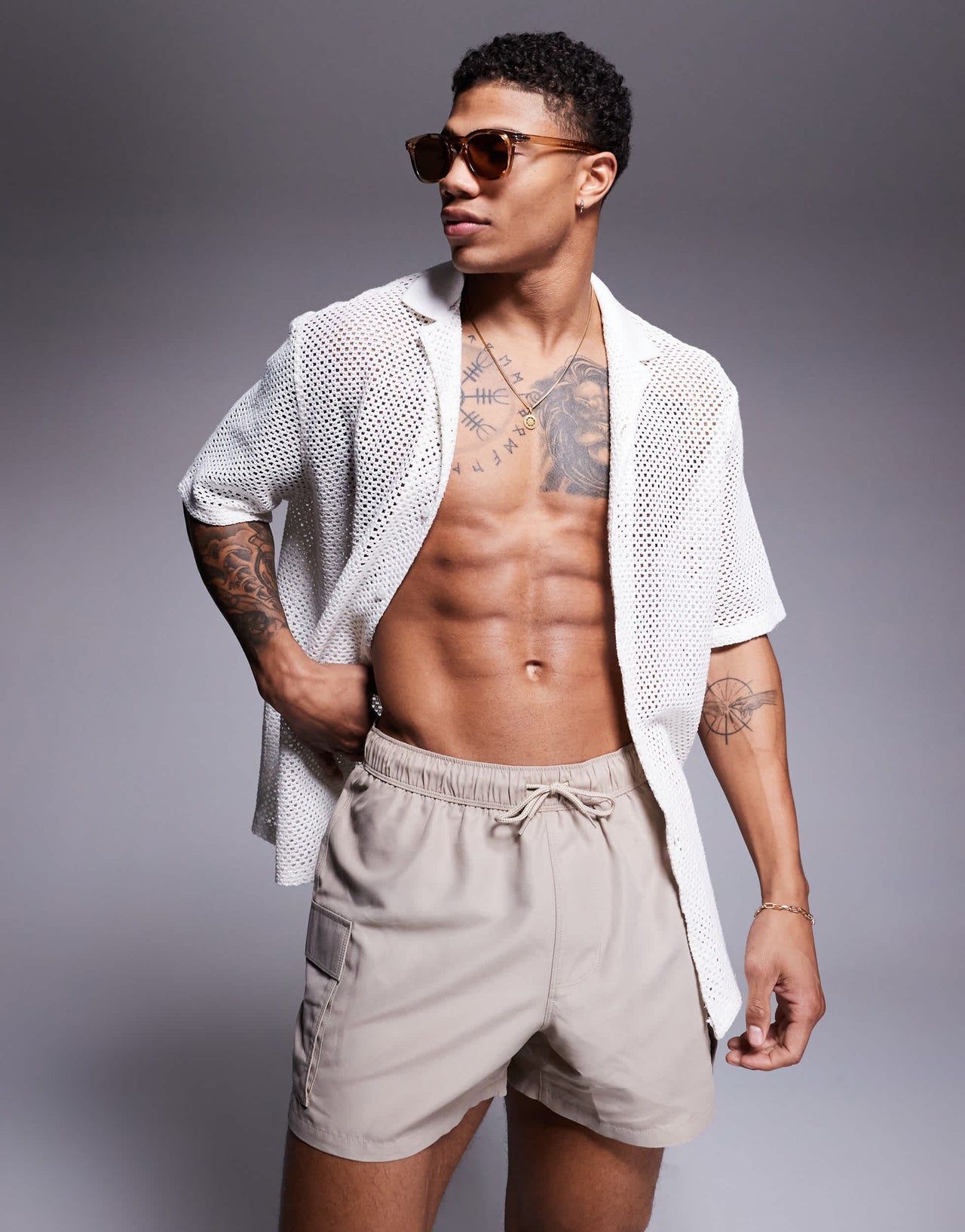 ASOS DESIGN swim shorts in short length with cargo pockets in stone
