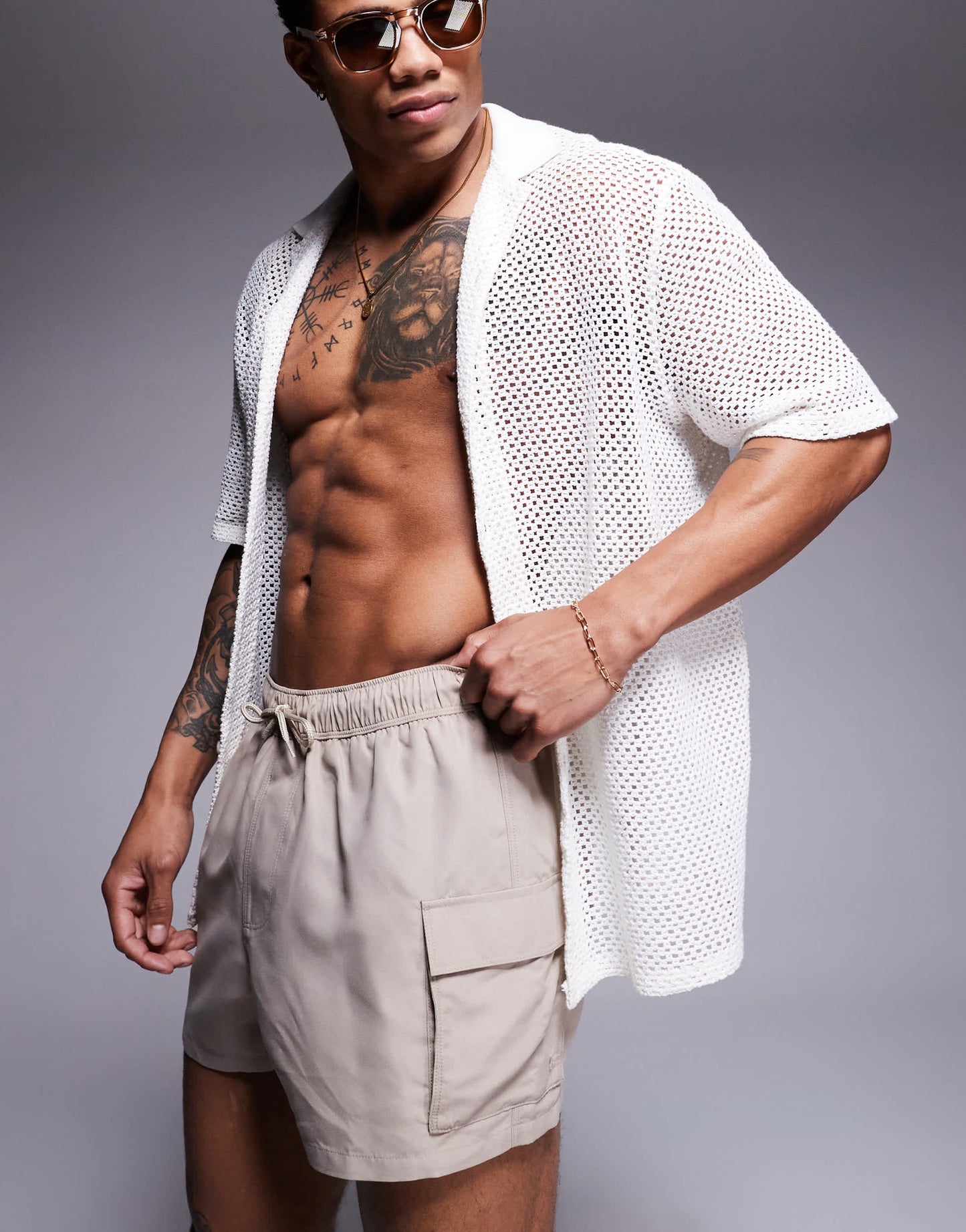 ASOS DESIGN swim shorts in short length with cargo pockets in stone