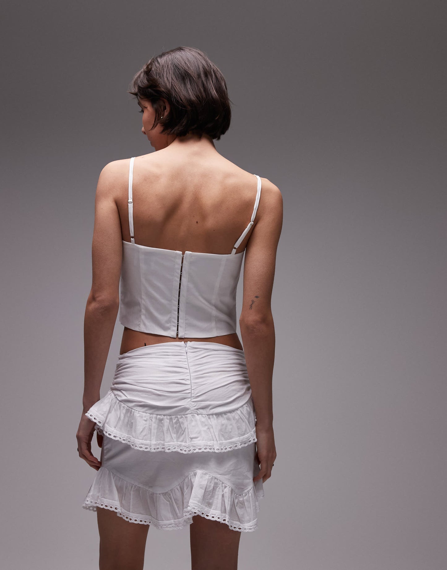 SNDYS ruffle broderie trim mini skirt in white