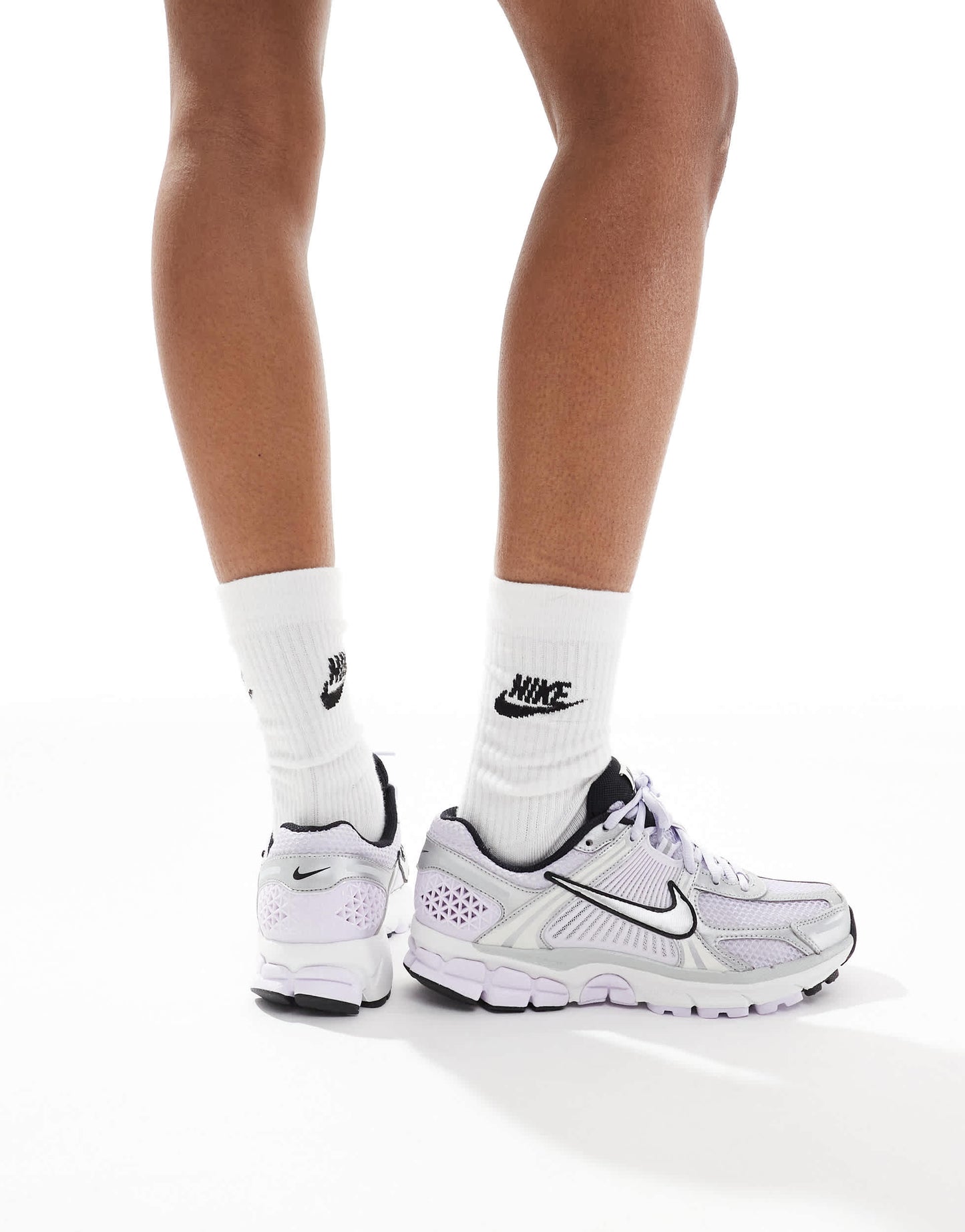 Nike Zoom Vomero 5 trainers in purple and white