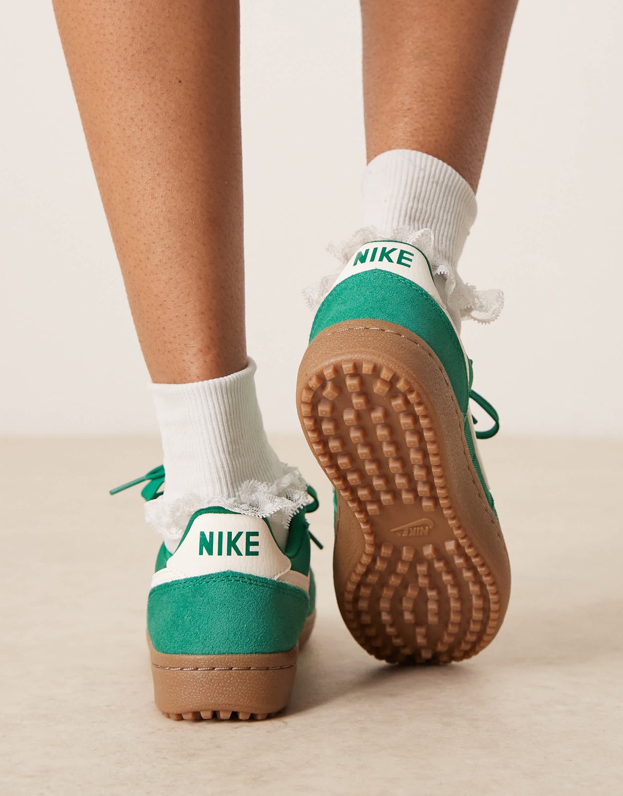 Nike Field General trainers in green and white