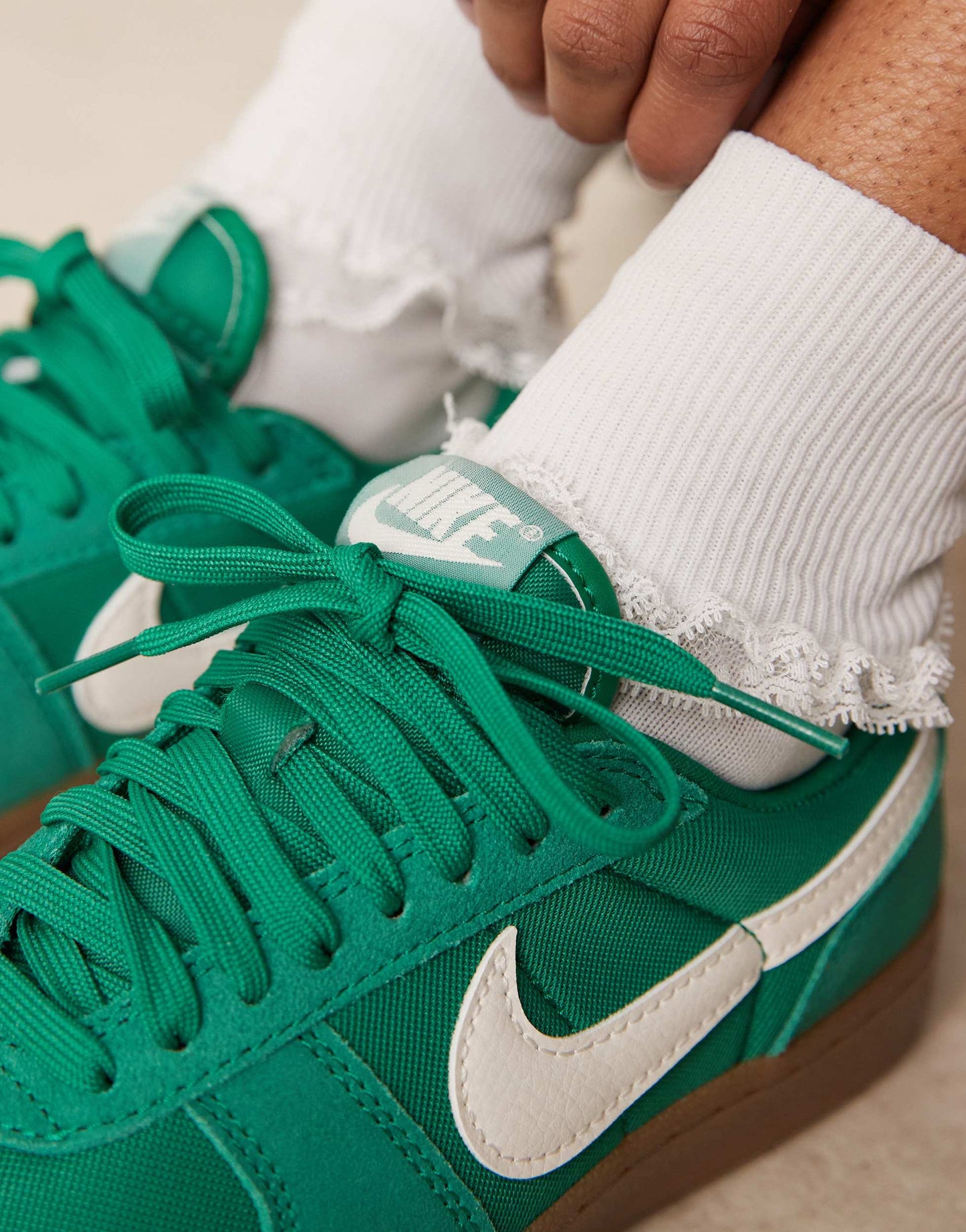 Nike Field General trainers in green and white