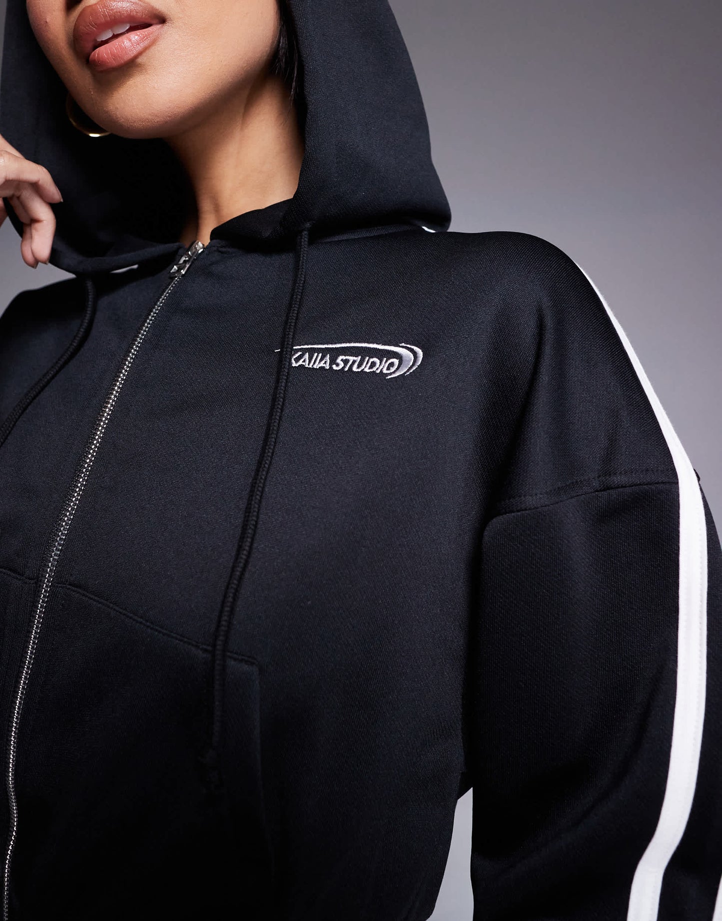 Kaiia cotton blend Studio cropped side stripe zip up hoodie co-ord in black