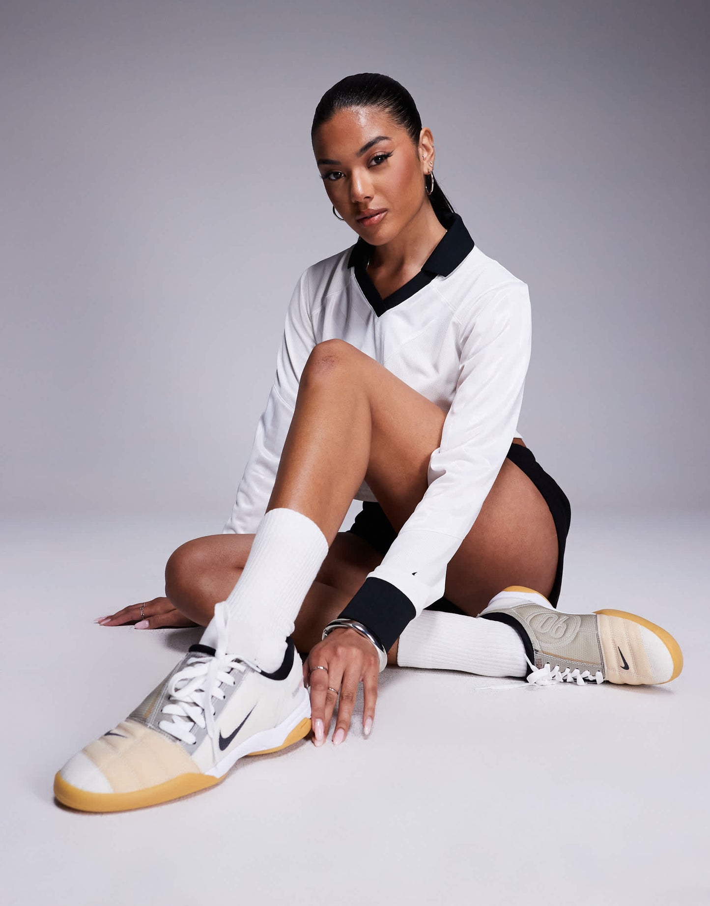 Nike T90 trainers in white & black