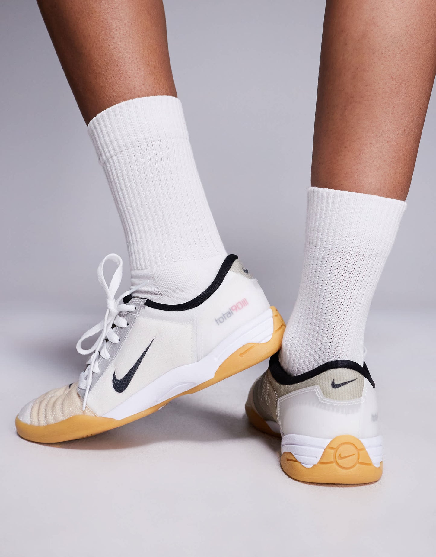 Nike T90 trainers in white & black