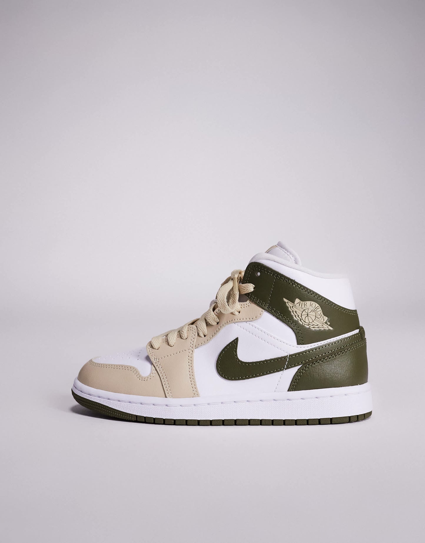 Nike Air Jordan 1 Mid trainers in white and khaki