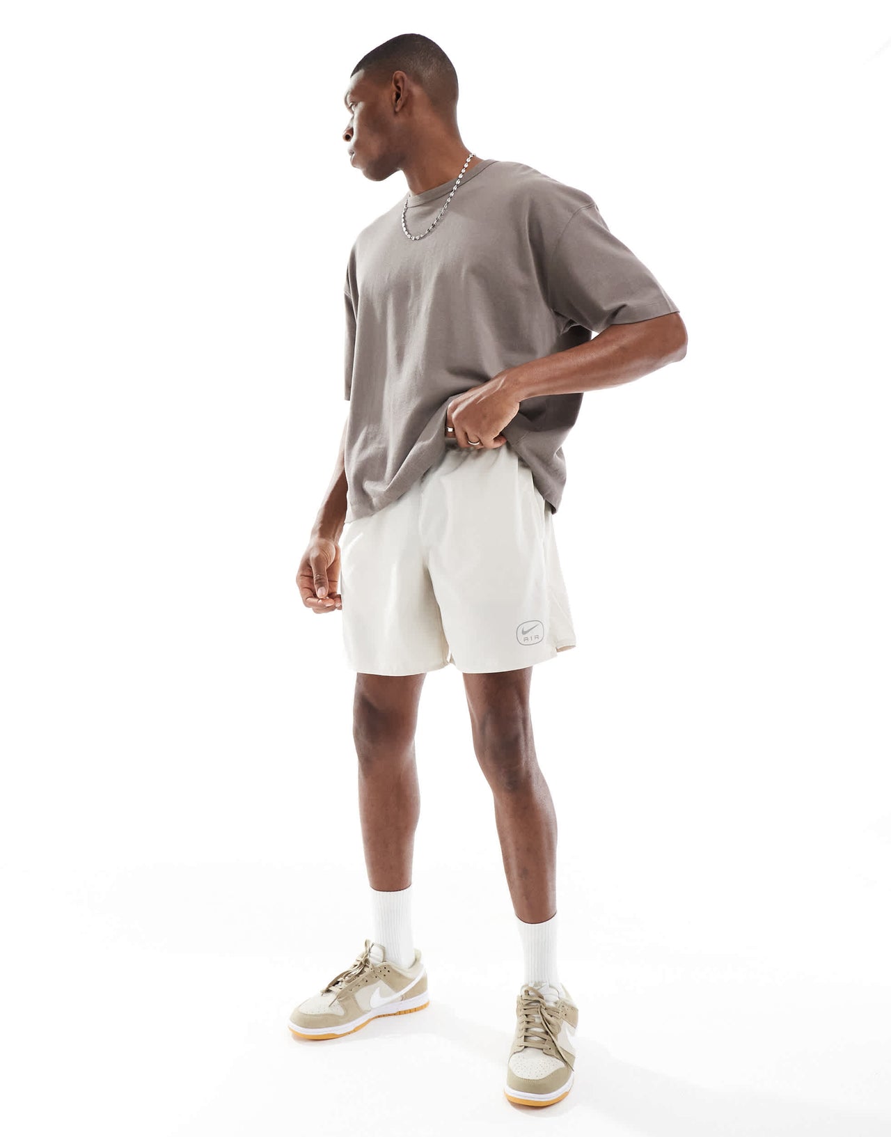 Nike Air Run shorts in beige