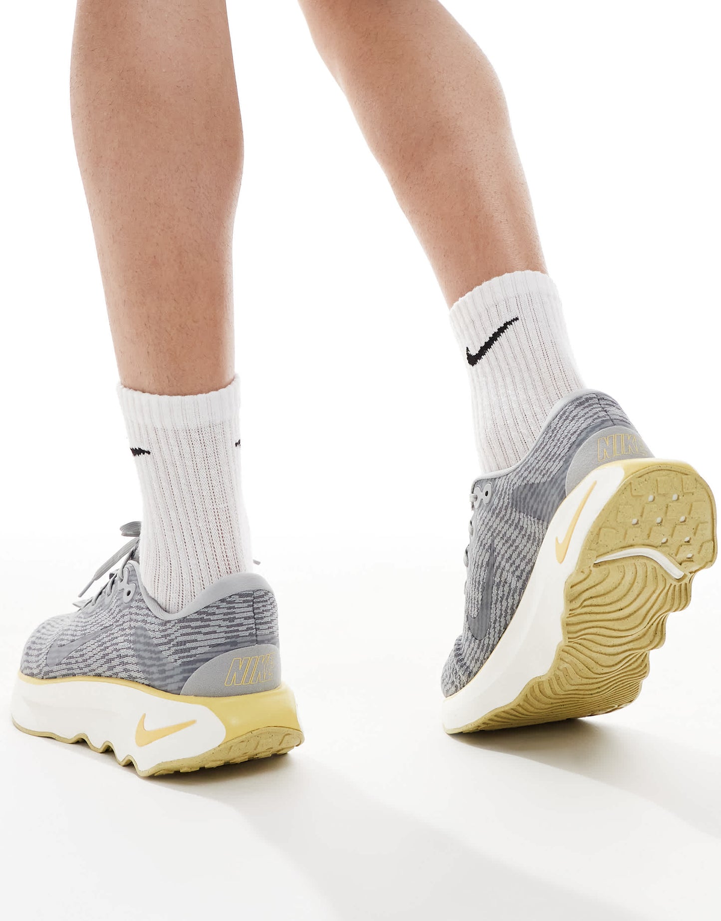 Nike Training Motiva trainers in grey