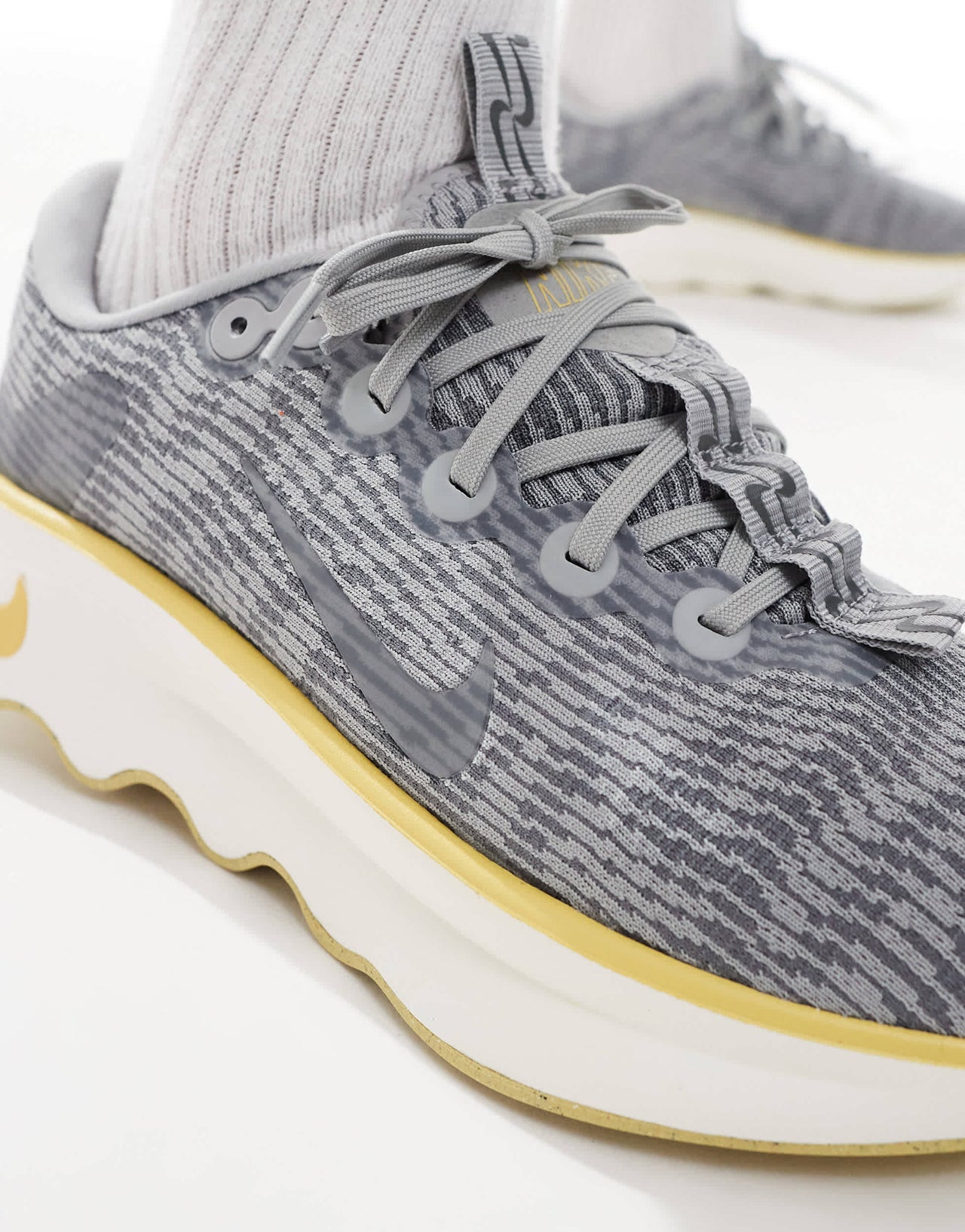 Nike Training Motiva trainers in grey