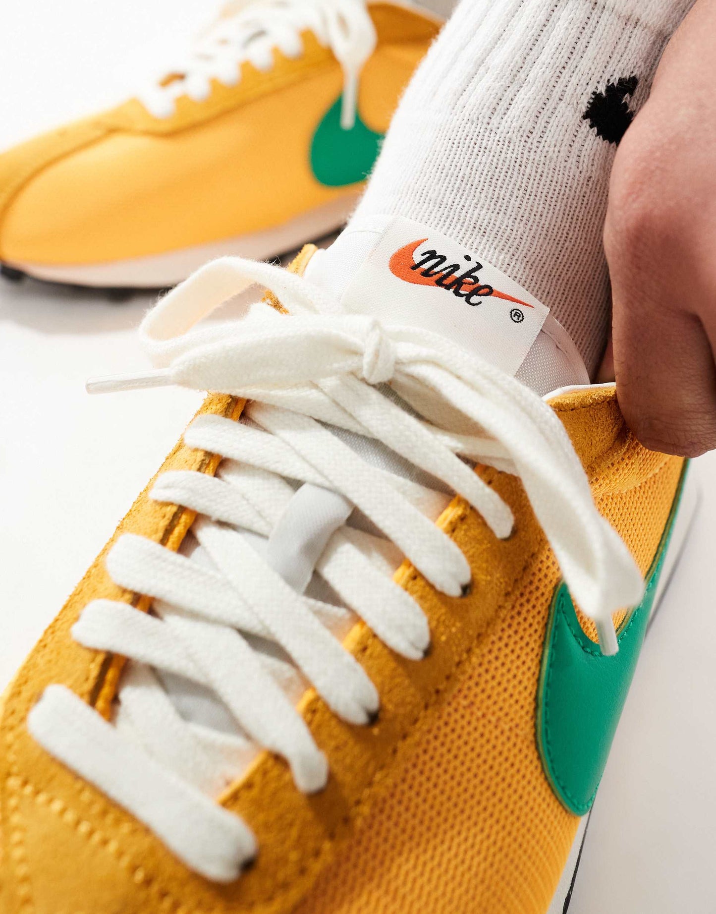 Nike LD-1000 trainers in orange and green