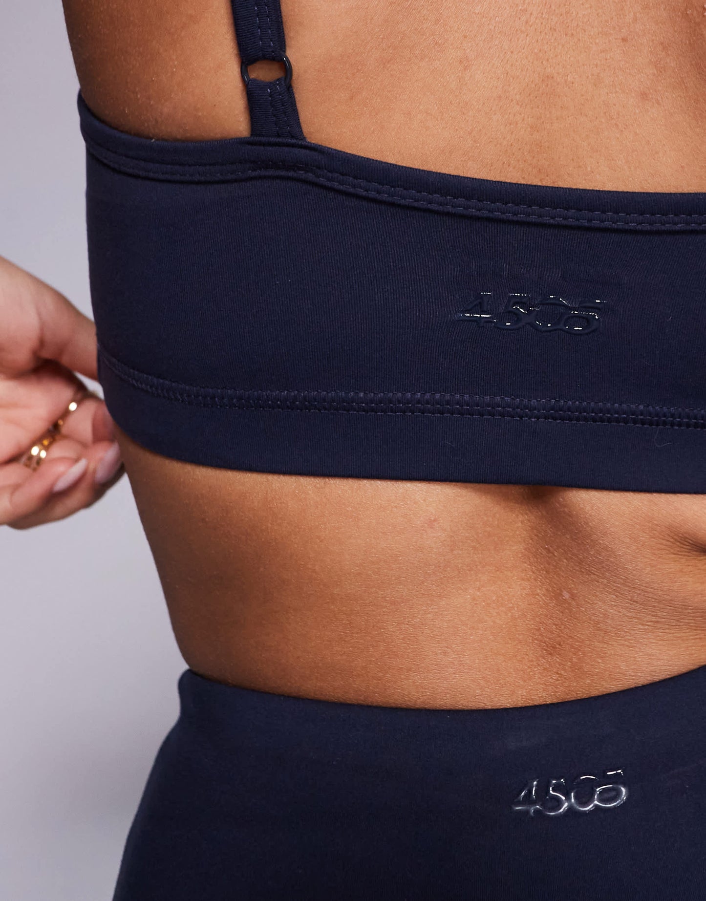 4505 Icon soft touch light support sports bra with adjustable straps in midnight navy