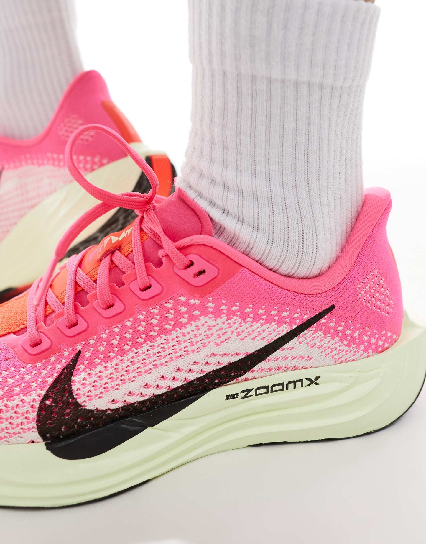Nike Running Pegasus Plus trainers in pink and green