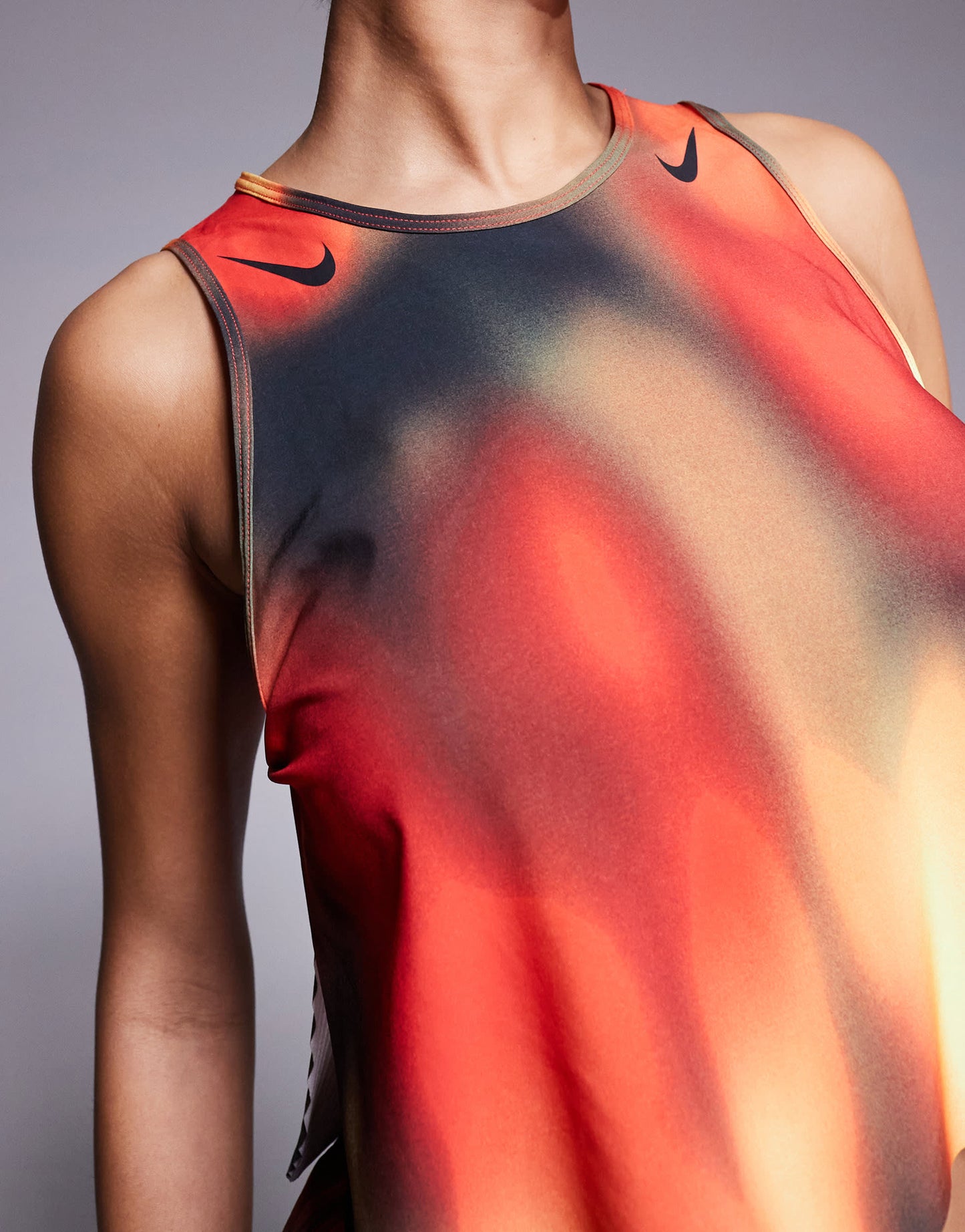 Nike Running Aeroswift Dri-FIT plisse printed vest in red and black