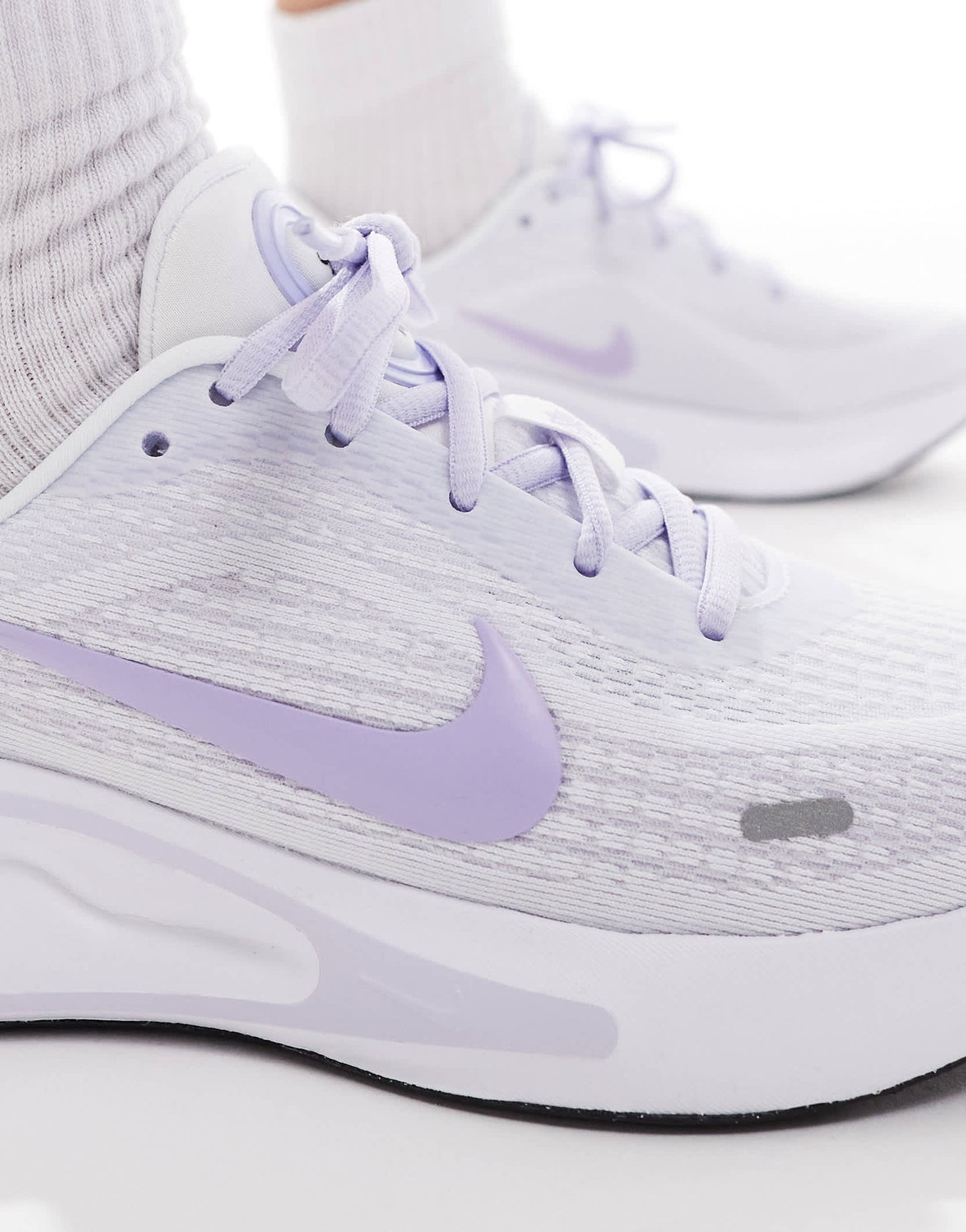 Nike Running Journey Run trainers in white and lilac