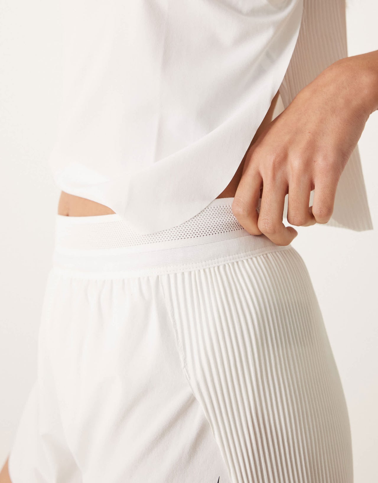 Nike Running Aeroswift Dri-FIT plisse mid rise shorts in white - WHITE