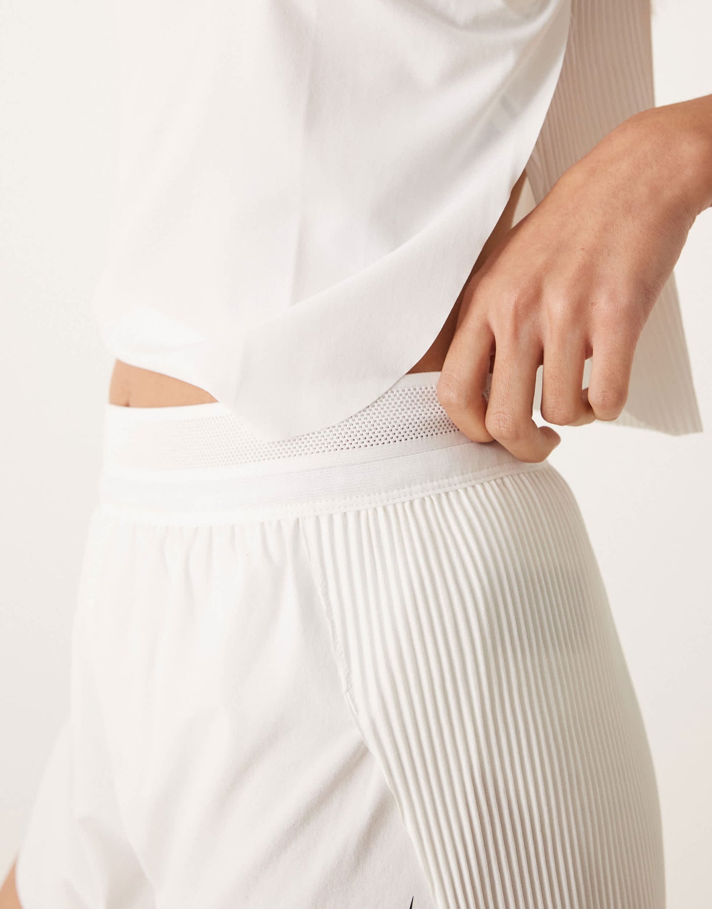 Nike Running Aeroswift Dri-FIT plisse mid rise shorts in white - WHITE
