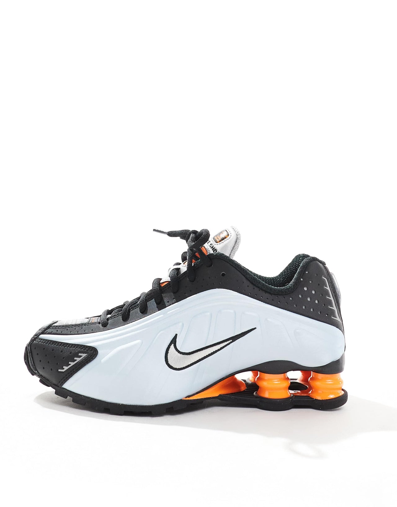 Nike Shox R4 trainers in black and metallic silver