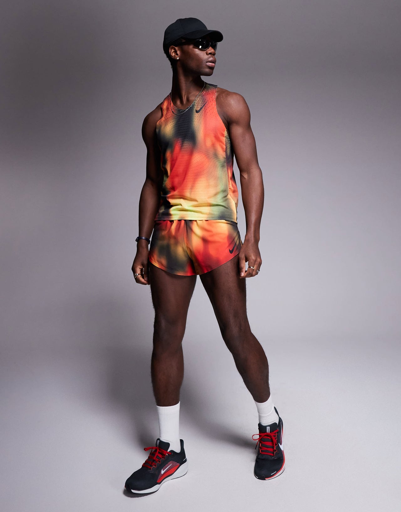 Nike Running Aeroswift Dri-FIT vest in red, yellow and black