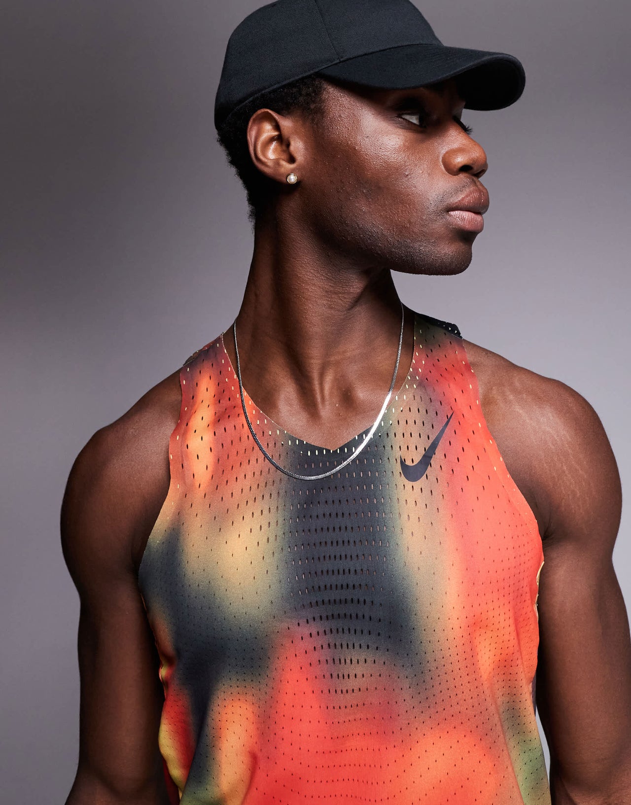 Nike Running Aeroswift Dri-FIT vest in red, yellow and black