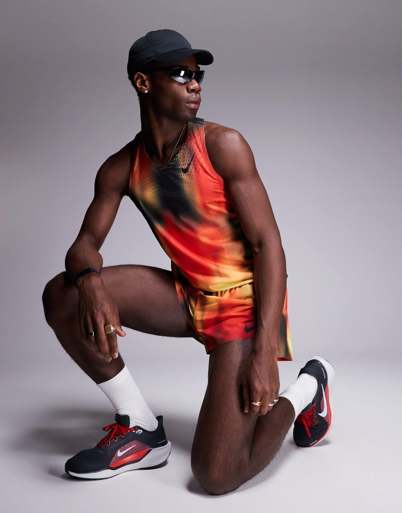Nike Running Aeroswift Dri-FIT vest in red, yellow and black