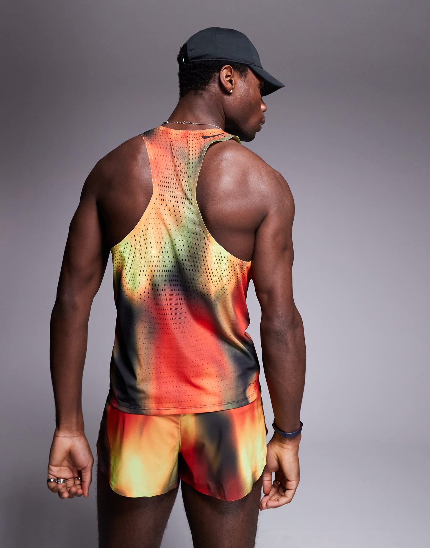 Nike Running Aeroswift Dri-FIT vest in red, yellow and black